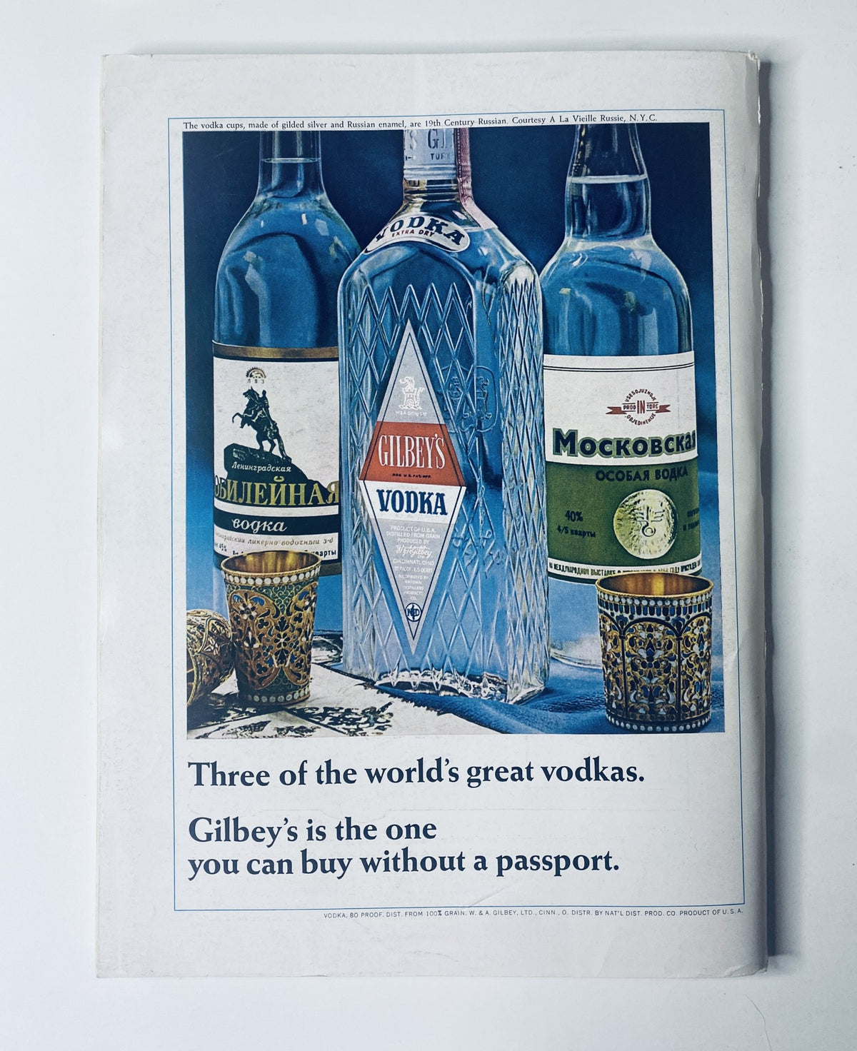 Vintage advertisement for Gilbey's Vodka in The New Yorker Magazine October 15, 1966 showcasing three types of vodka and promoting Gilbey's as the best choice.