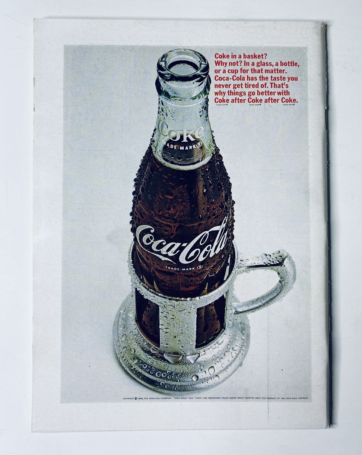 Back cover of The New Yorker Magazine June 18, 1966, featuring a Coca-Cola advertisement with a classic bottle and slogan promoting the beverage.