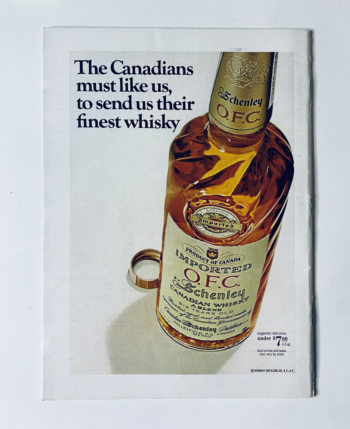 Advertisement from The New Yorker Magazine July 1, 1967 featuring a bottle of imported Canadian whisky, emphasizing the connection between Canada and the USA.