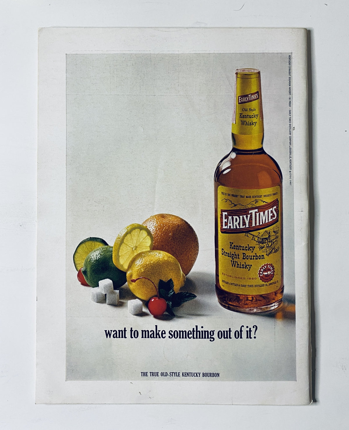 An advertisement for Early Times Kentucky Straight Bourbon Whiskey featuring a bottle and fresh citrus fruits including lemons and limes, with sugar cubes. The ad prompts, 'want to make something out of it?' The New Yorker Magazine August 19, 1967 Architecture Cover Charles Martin VG.