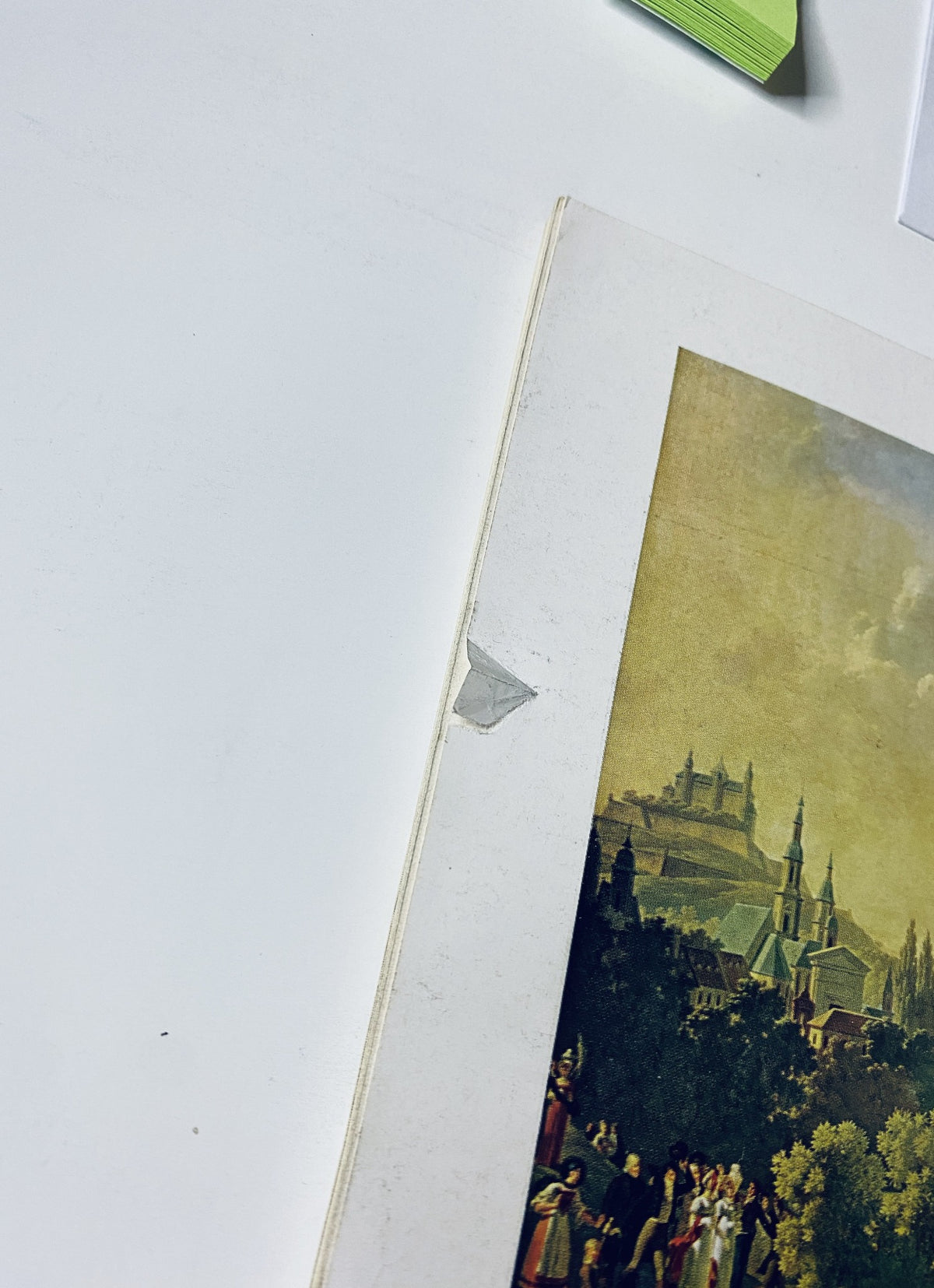 Close-up of damage on the edge of The New Yorker Magazine March 25, 1967, displaying a tear.