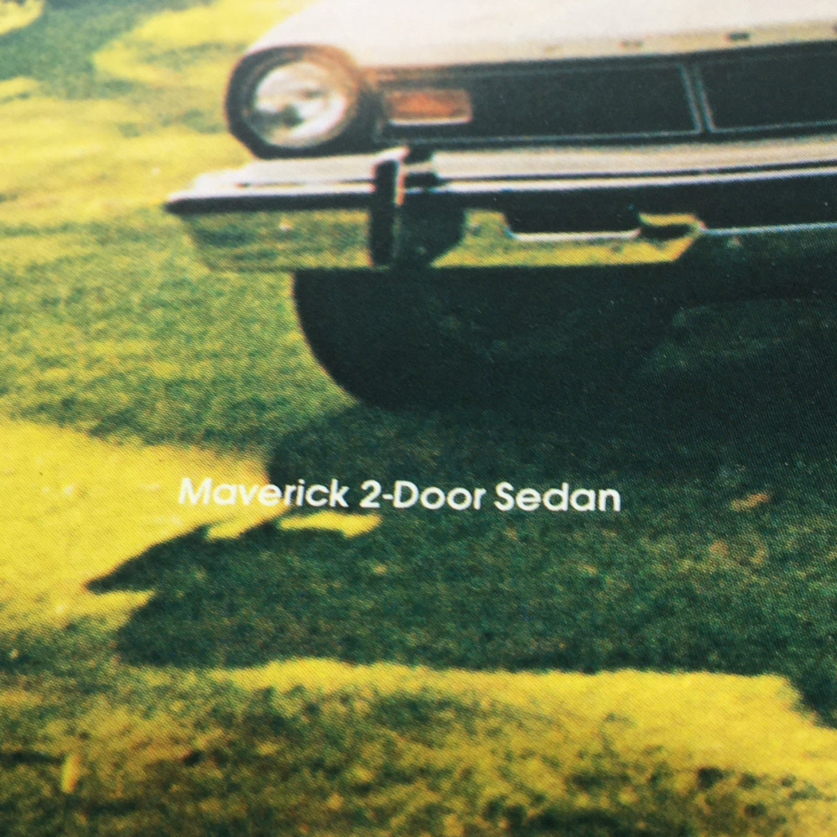 Vintage Free Wheelin' Mustang II MPG 2+2 Stallion - 1965 Shelby Cobra Car Brochure depicting the Maverick 2-Door Sedan, highlighting its iconic design.