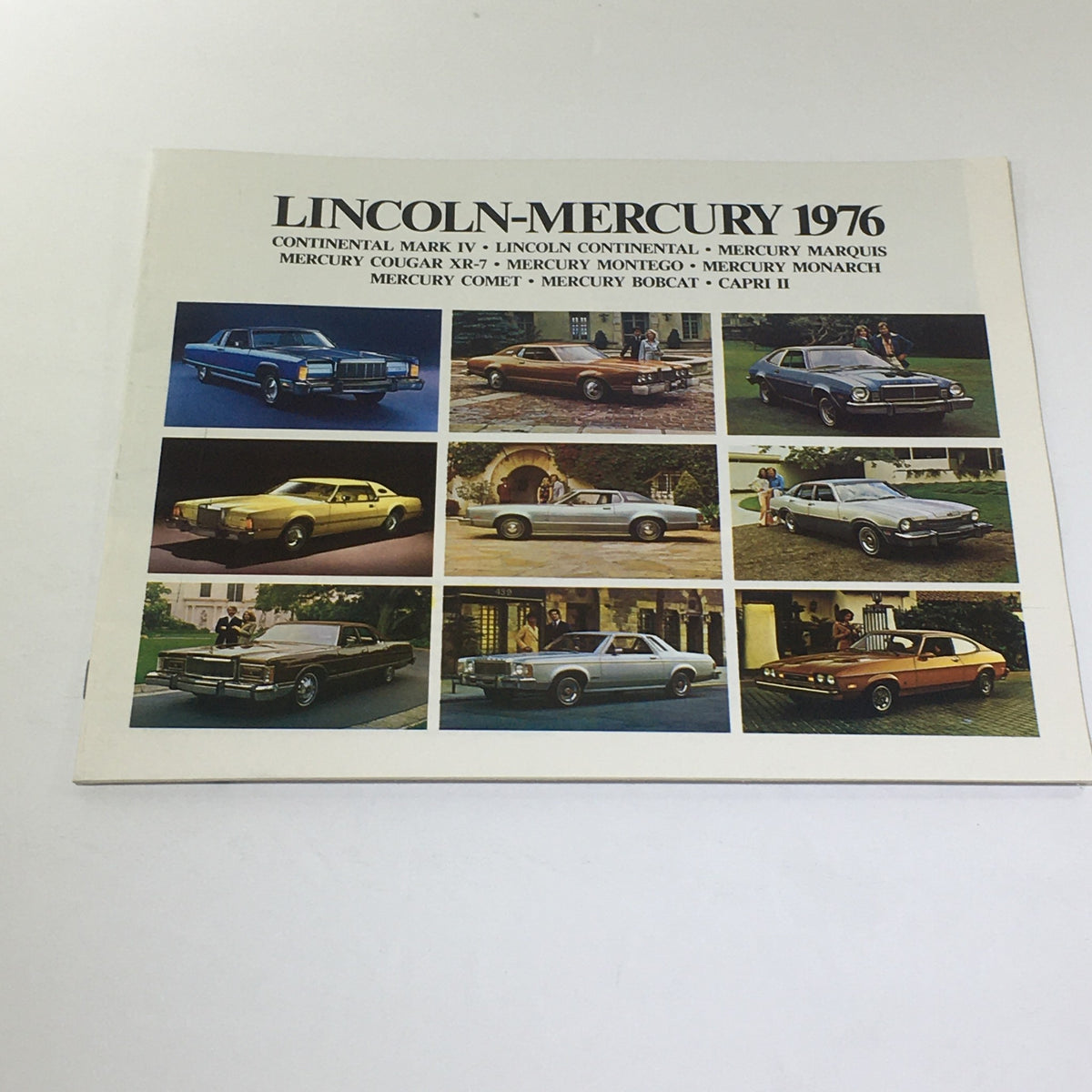 Vintage Lincoln-Mercury 1976 Mercury Grand Monarch Ghia car brochure cover featuring a collage of classic Lincoln and Mercury vehicles.