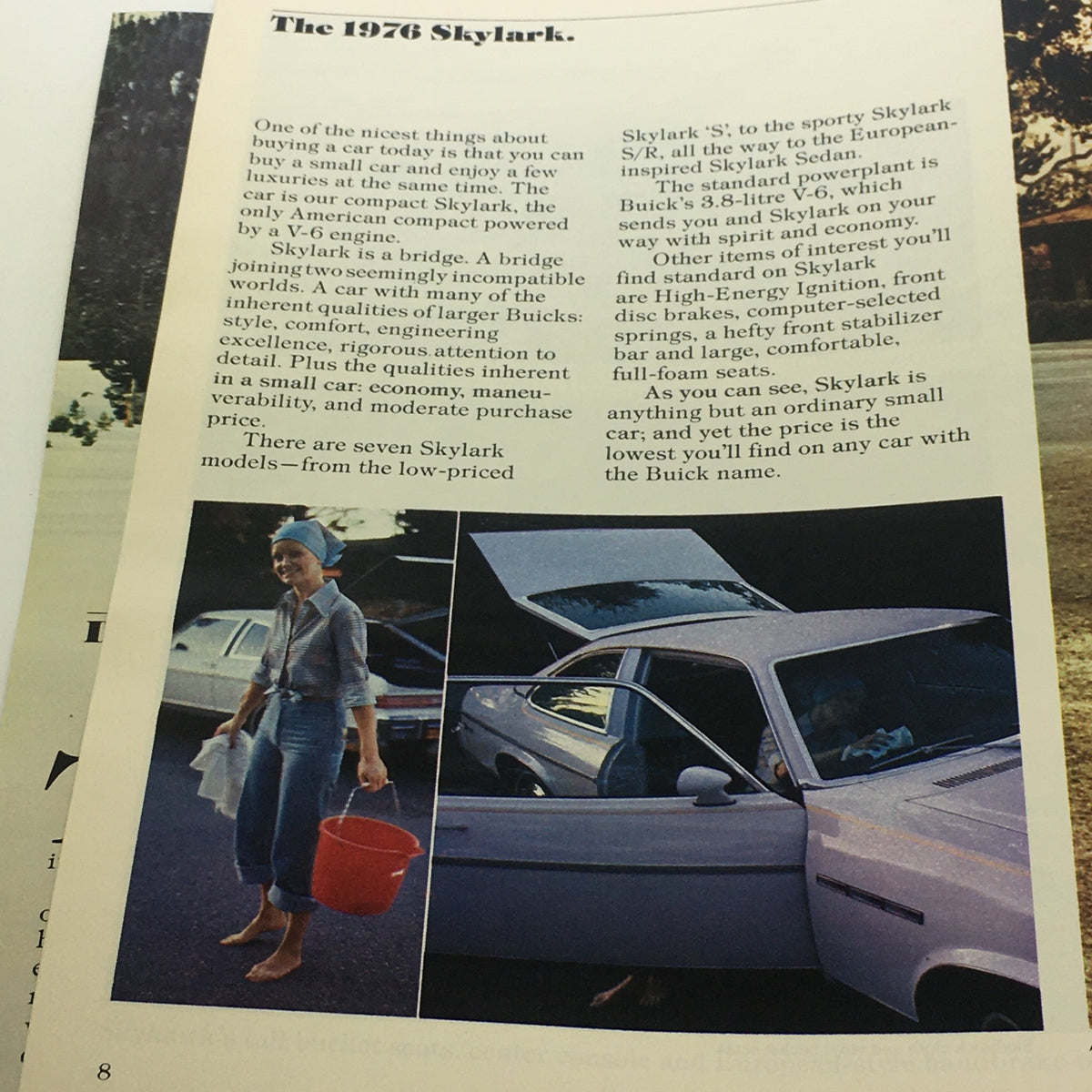 Page from the vintage 1976 Buick The Century Coupe catalog showcasing the 1976 Skylark model with a woman beside the car.