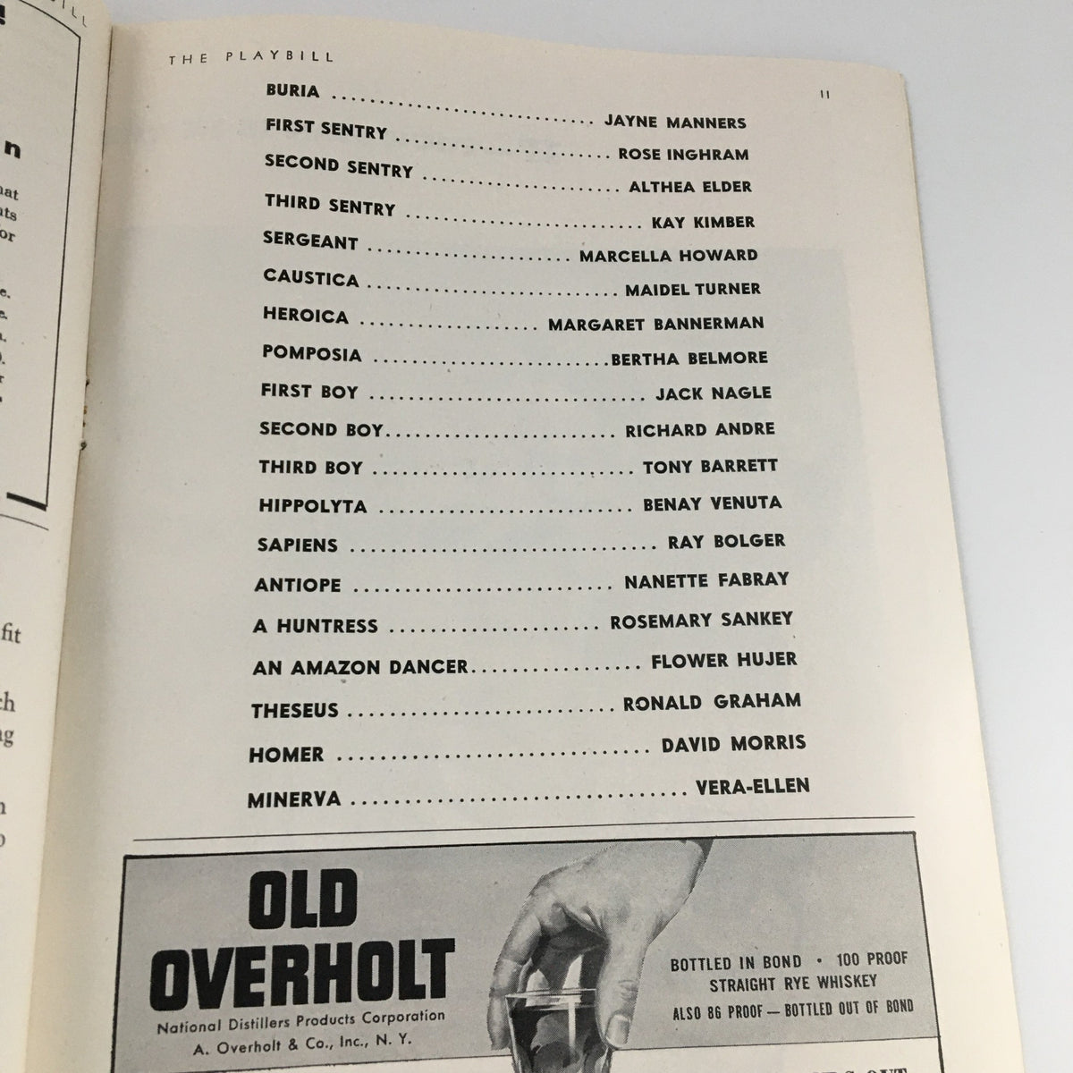 1943 Playbill for By Jupiter containing the continuation of the cast list and advertisements, highlighting the historical context of the production at Sam S. Shubert Theatre.