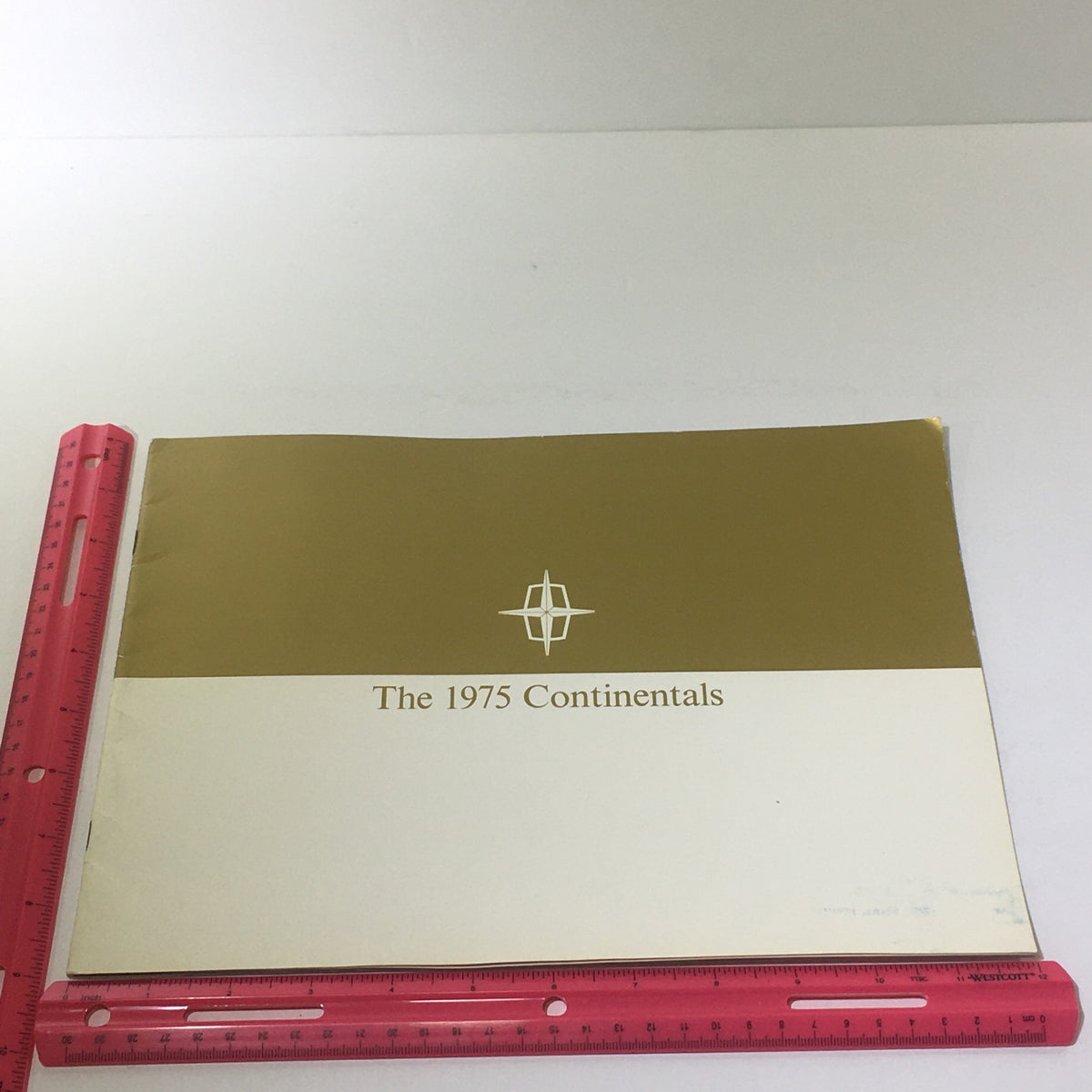 Front cover of the Vintage The 1975 Continentals Town Coupe/Town Car/Mark IV Car Catalog Brochure featuring the title and logo.
