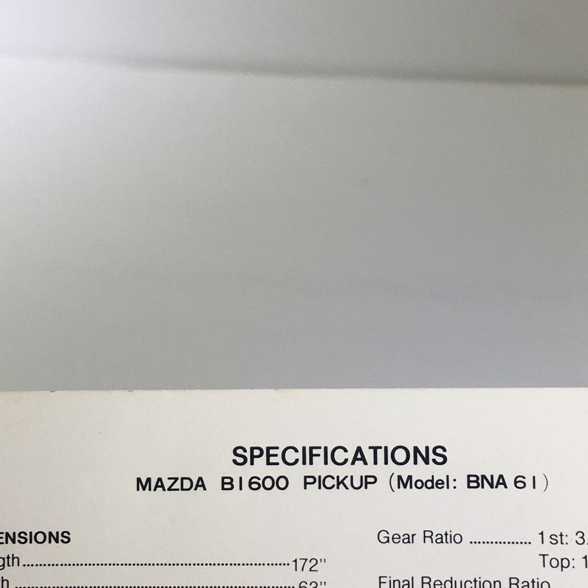 Overview of specifications for the 1975 Mazda B1600 Pickup highlighting measurements and gear ratios, part of the 1975 Mazda B1600 Pickup Sport Truck Car Auto Brochure Catalog.