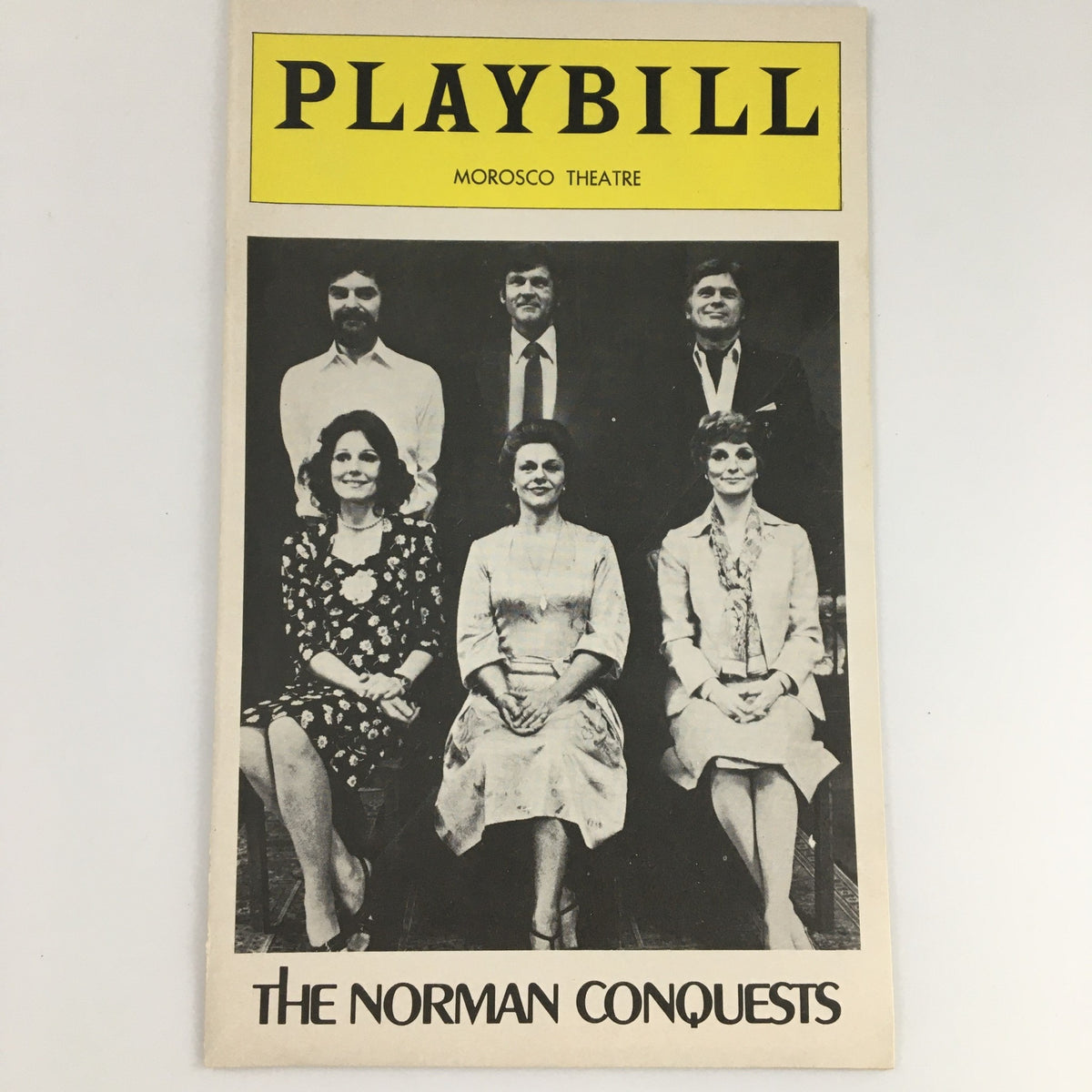 1976 Playbill for 'The Norman Conquests' at Morosco Theatre featuring cast members in black and white photograph.