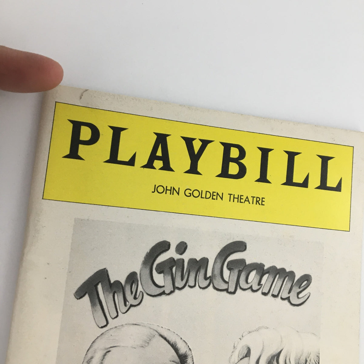 Close-up image of the 1977 Playbill for 'The Gin Game' at the John Golden Theatre, showcasing the title prominently.