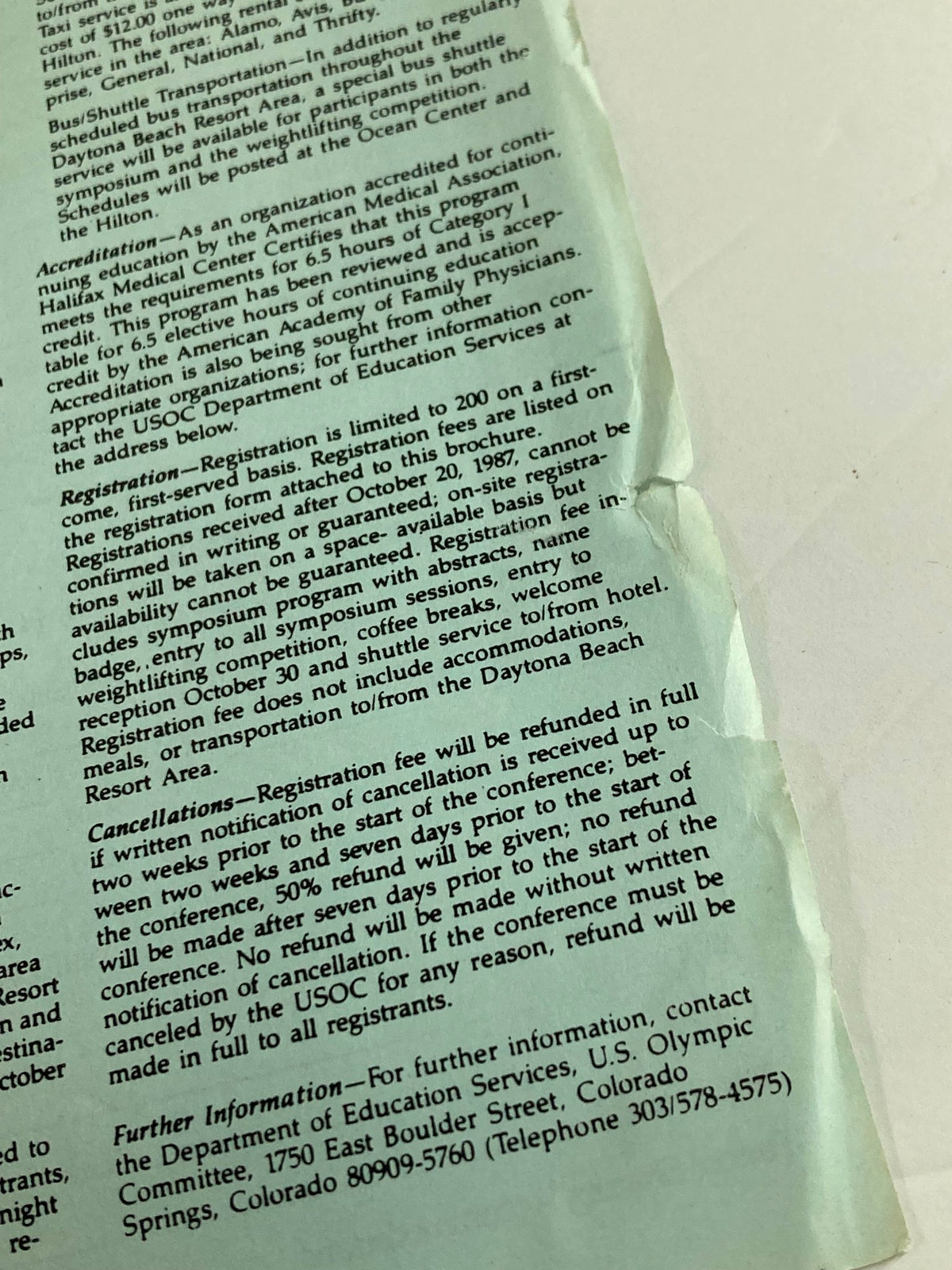 Back cover of the Vintage Weightlifting USA Magazine 1987 Vol 5 #4 with registration information and details relevant to the U.S. Olympic Committee.