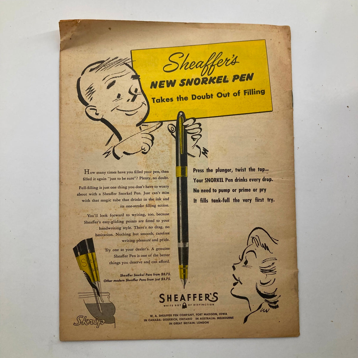 Advertisement for Sheaffer's New Snorkel Pen featured in the VTG Junior Scholastic Magazine April 20, 1955, showcasing its filling mechanism and promotional details.