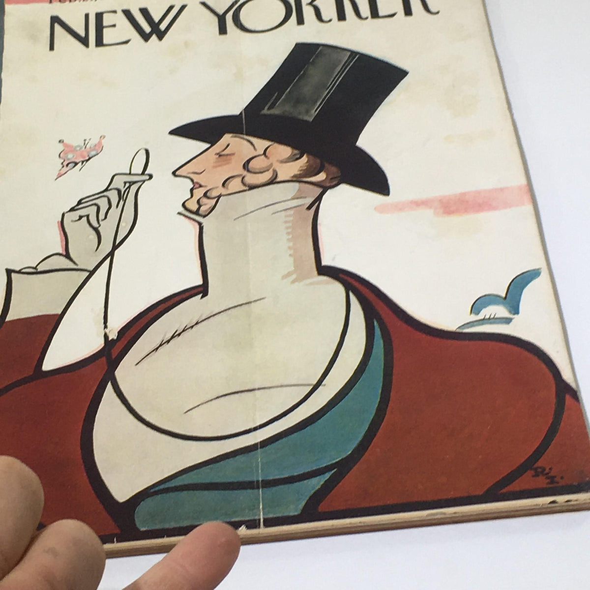 Close-up view of The New Yorker magazine cover from February 21, 1959 highlighting a detailed illustration of a man in a top hat by Rea Irving.