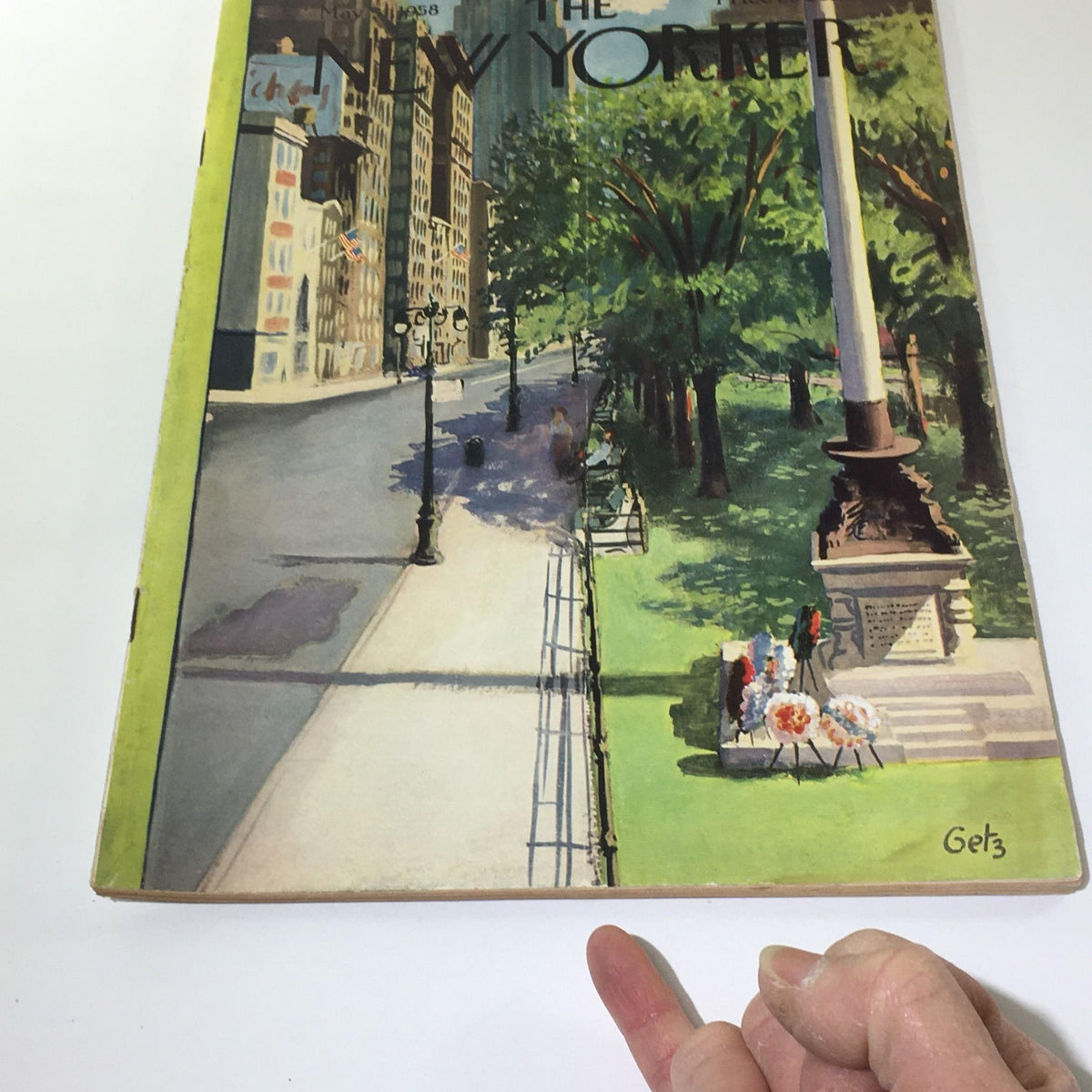 Detailed view of The New Yorker magazine cover from May 10, 1958 showing Arthur Getz's illustration of a vibrant city park.