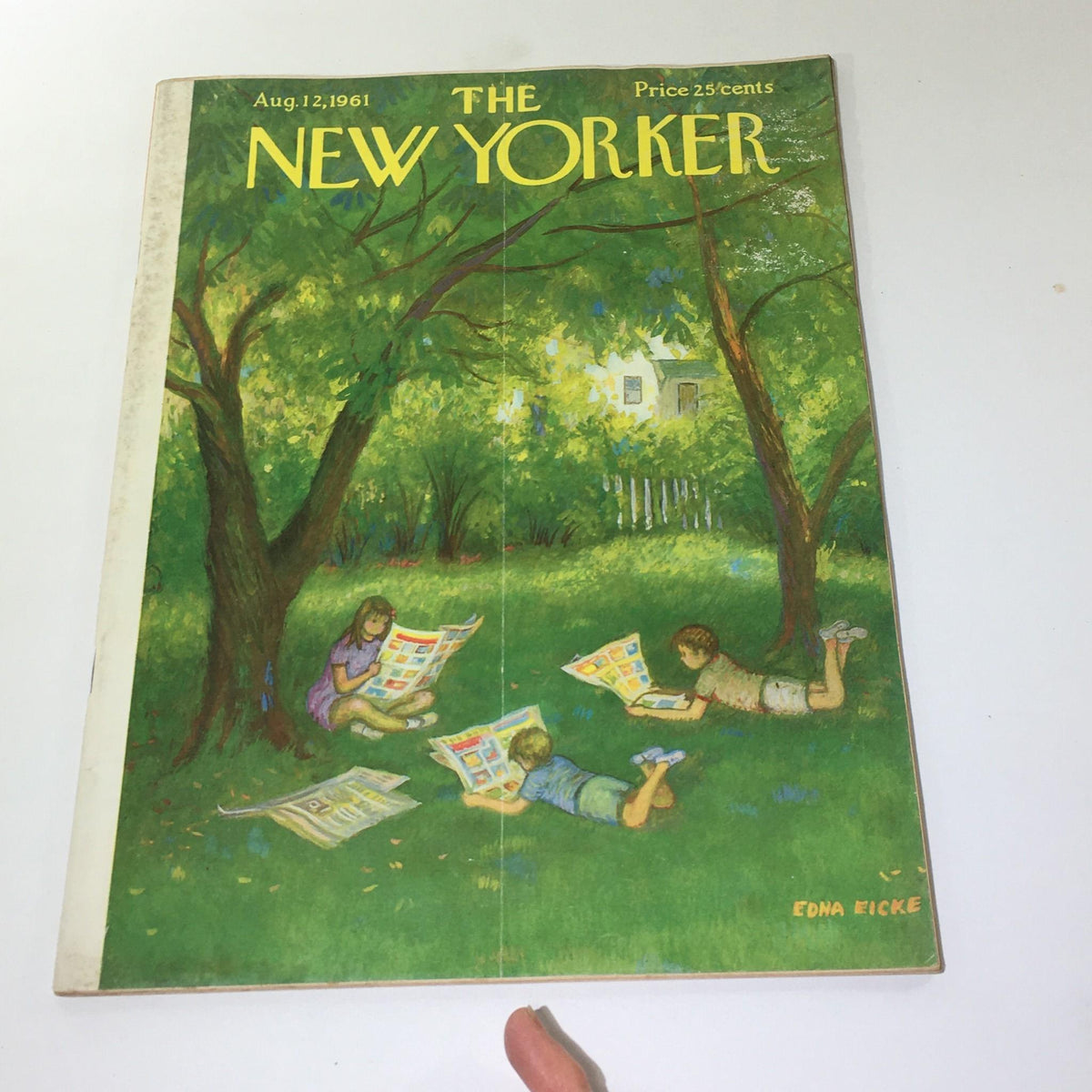 The New Yorker: August 12, 1961 magazine cover illustrated by Edna Eicke, showing playful children engaged with their reading materials under lush greenery.