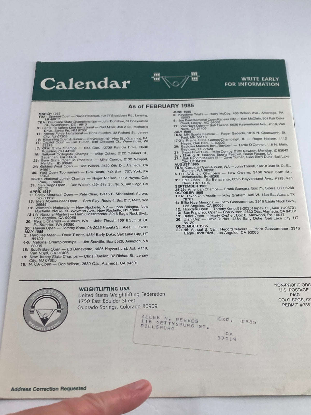 Back cover of the VTG Weightlifting USA Magazine Vol 3 #1 1985, featuring a calendar of events and contact information for the United States Weightlifting Federation, highlighting Olympic training and competitions.