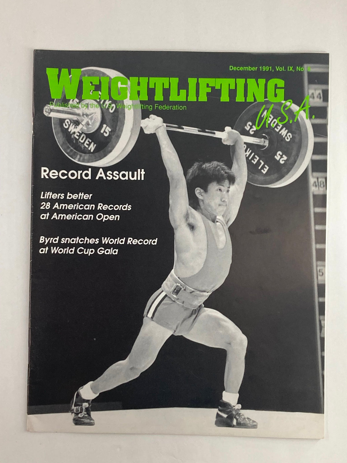 Cover of VTG Weightlifting USA Magazine Vol 9 #6 December 1991 featuring an athlete performing a weightlifting lift. The magazine highlights record-breaking achievements at the American Open and the World Cup Gala.