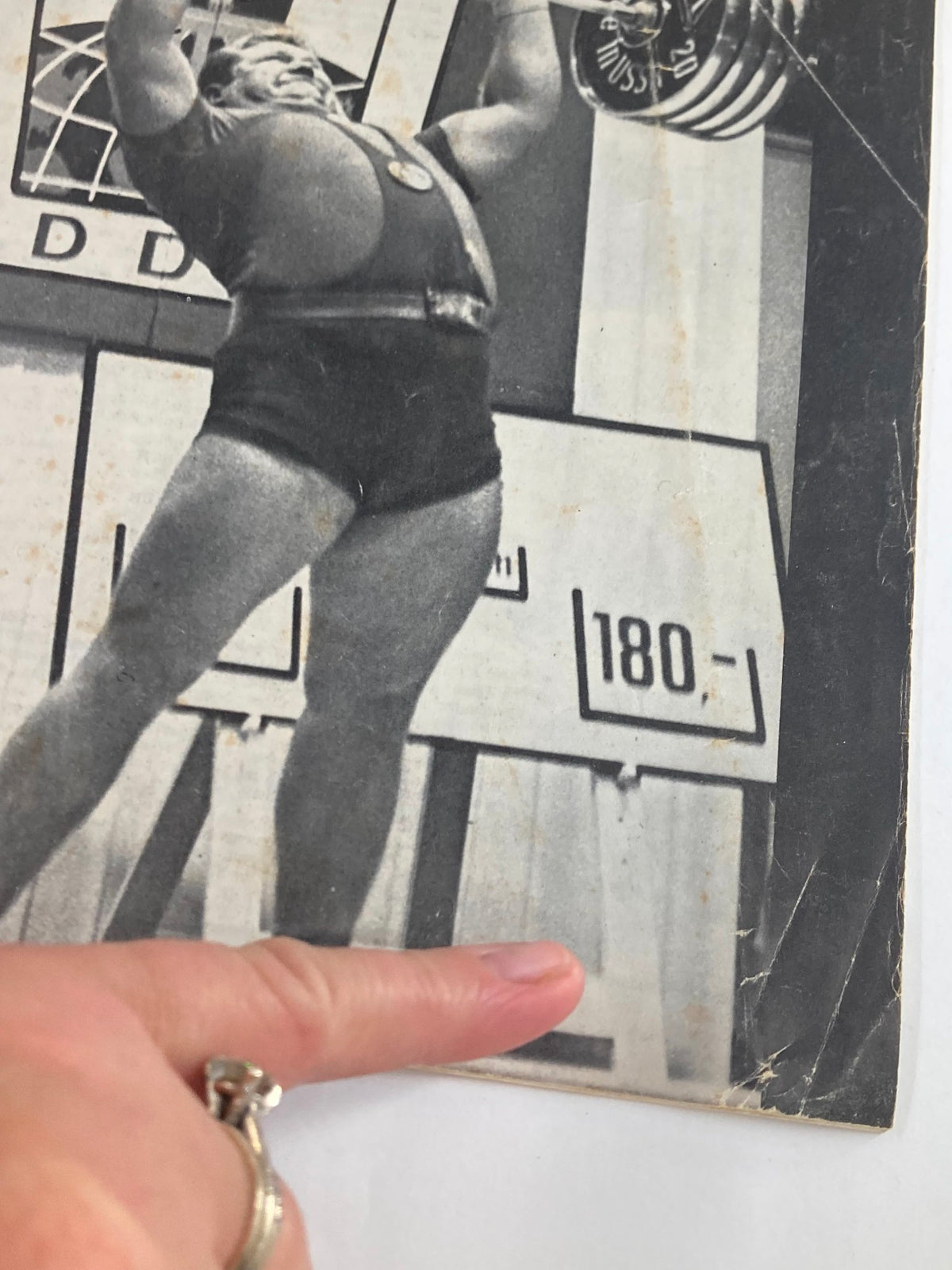 Close-up of the cover of VTG Iron Man Lifting News Vol 13 #4 January 1967, highlighting Leonid Zhabotinski lifting weights with a background score display.