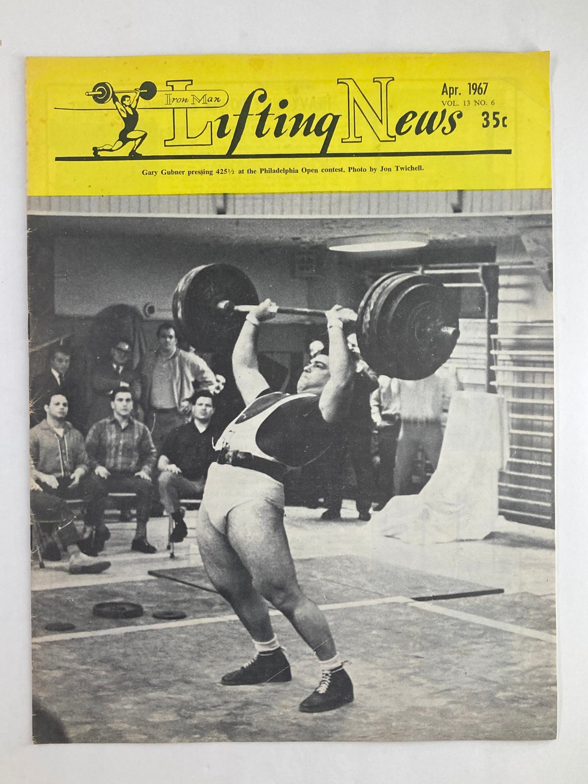 Cover of VTG Iron Man Lifting News Vol 13 #6 April 1967 featuring Gary Gubner lifting 425.5 pounds at the Philadelphia Open contest. The magazine's title prominently displayed in yellow along with a photo credit to Jon Twichell.