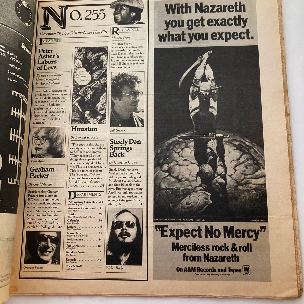 Interior page of VTG Rolling Stone Magazine December 29 1977 Issue 255 displaying the features section, including articles about Peter Asher, Graham Parker, and Steely Dan.