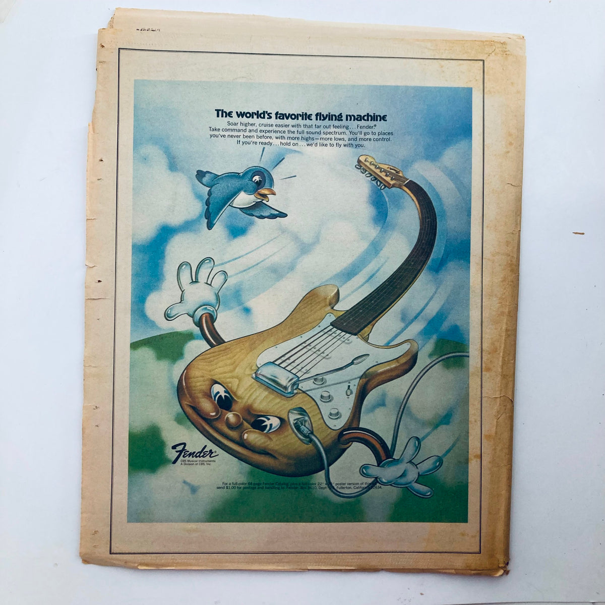 Back cover of Vintage Rolling Stone Magazine, September 13, 1973, Issue 143, featuring a whimsical advertisement for Fender guitars with a cartoon design.