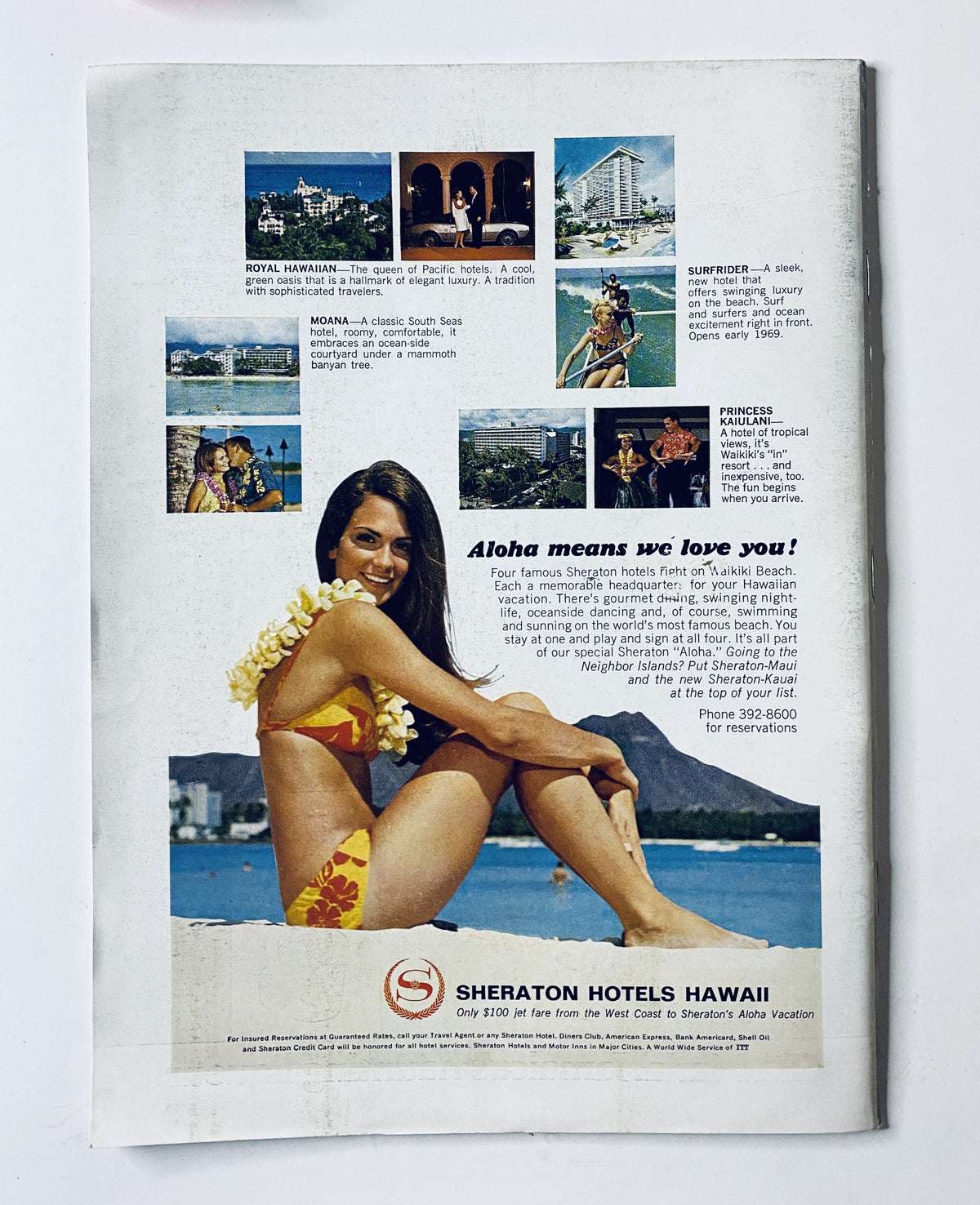 Back cover of The New Yorker Magazine January 4, 1969 featuring an advertisement for Sheraton Hotels Hawaii with a model in a floral swimsuit, promoting vacation deals.