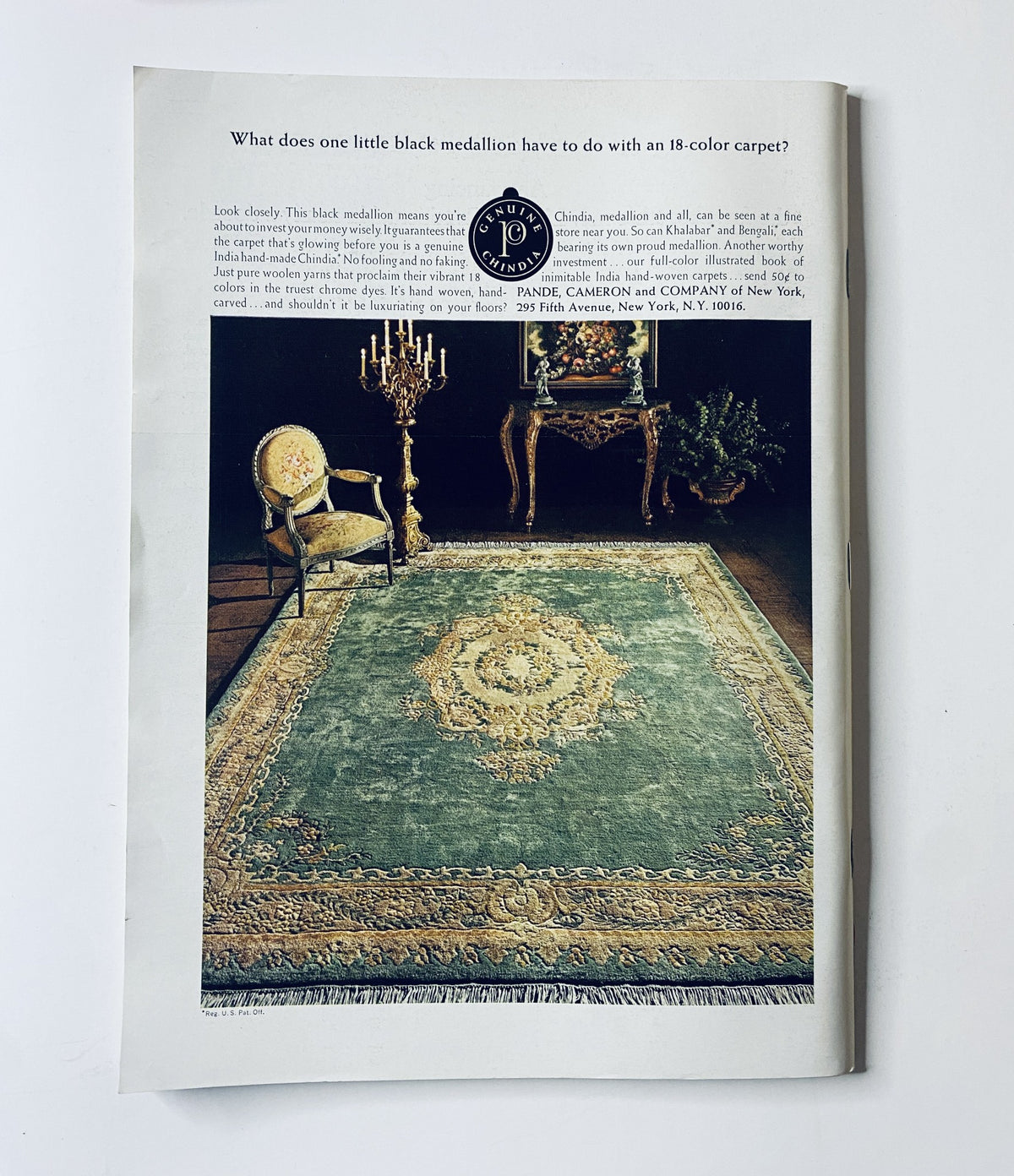 Vintage advertisement featuring a luxurious room setting with an elegant chair and an ornate rug, related to The New Yorker Magazine September 27, 1969 André François Animal Window Cover. This advertisement highlights a black medallion design on an 18-color carpet, showcasing the style of the era.