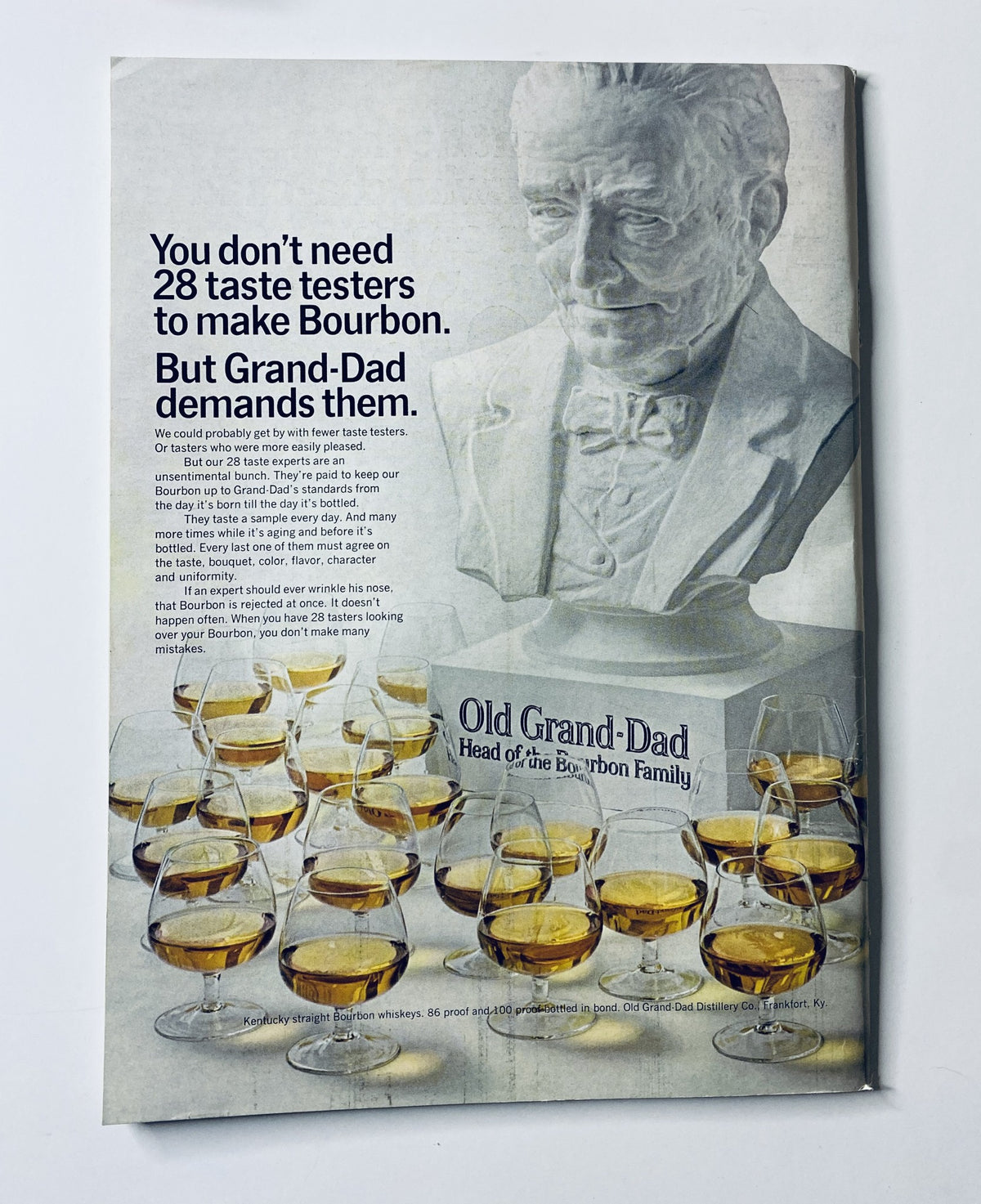Advertisement for Old Grand-Dad bourbon featuring a bust statue and glasses of bourbon, from The New Yorker Magazine March 2, 1968, promoting the brand's heritage.