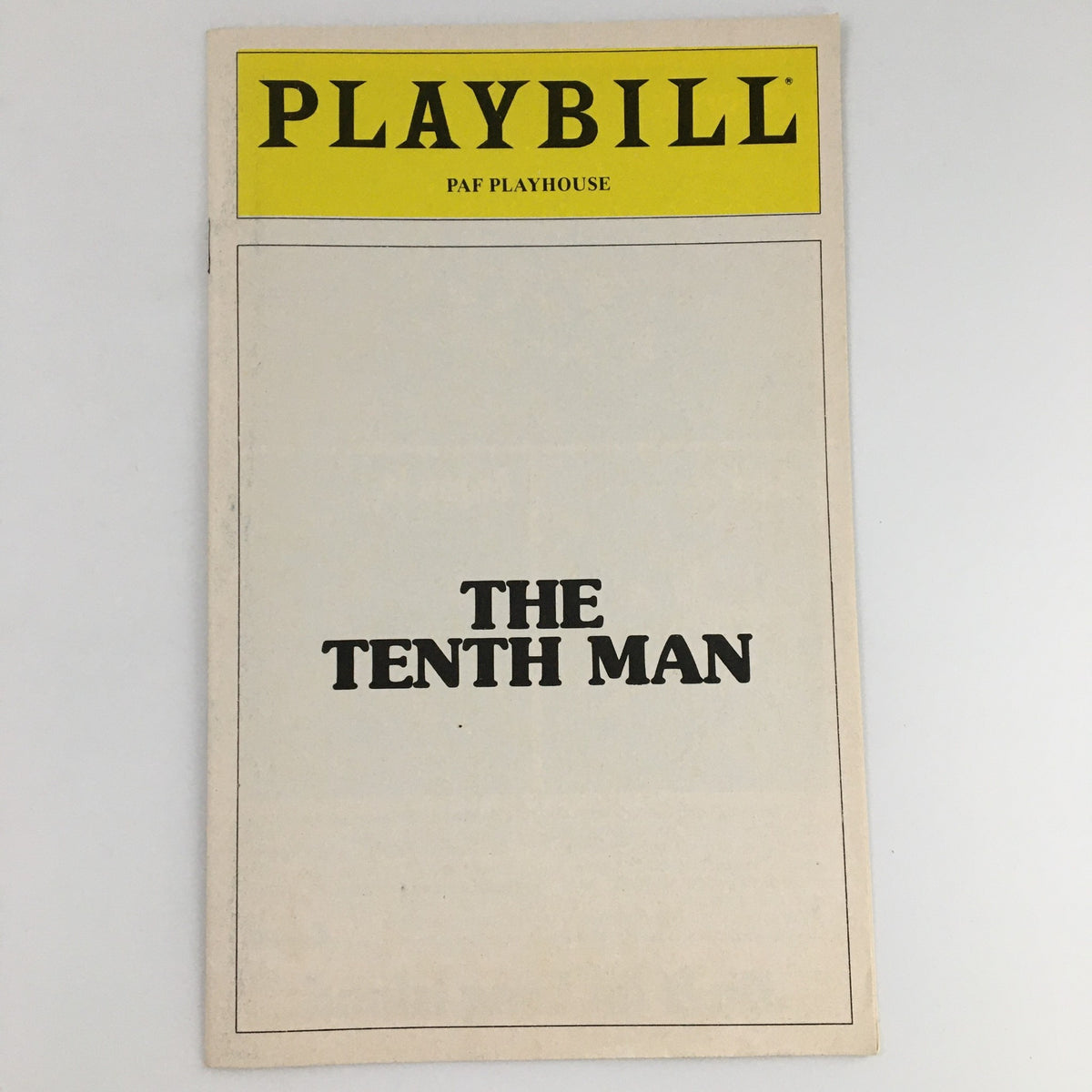 1980 Playbill for 'The Tenth Man' at PAF Playhouse featuring a blank cover design.