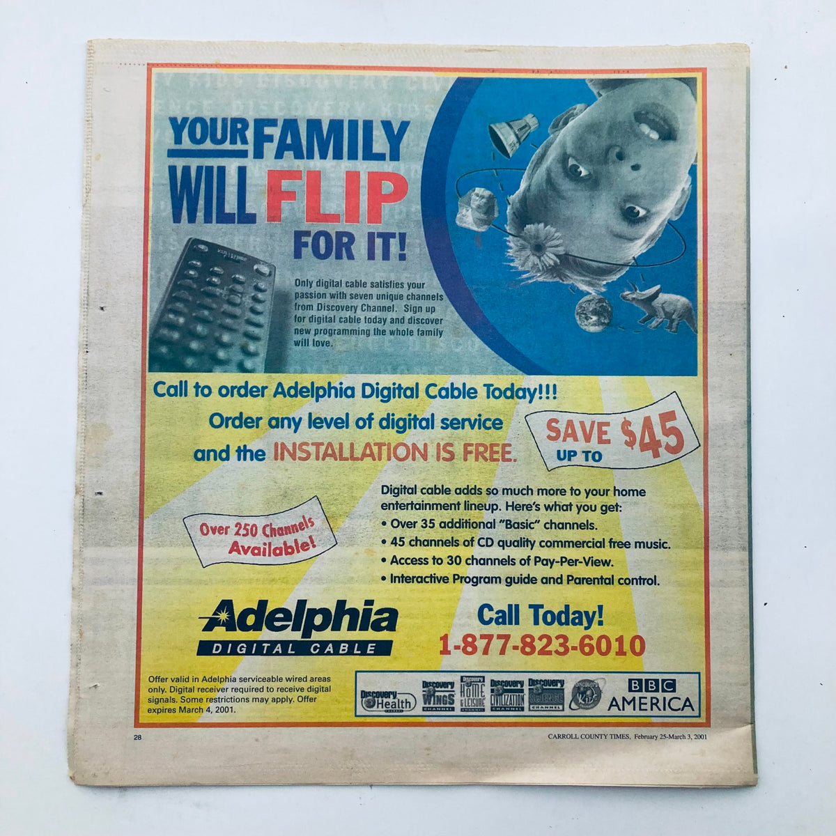 Advertisement page in TV Week Magazine February 25, 2001, promoting Adelphia Digital Cable with a focus on entertainment services, showcasing a playful cartoon of a baby and promotional offers.