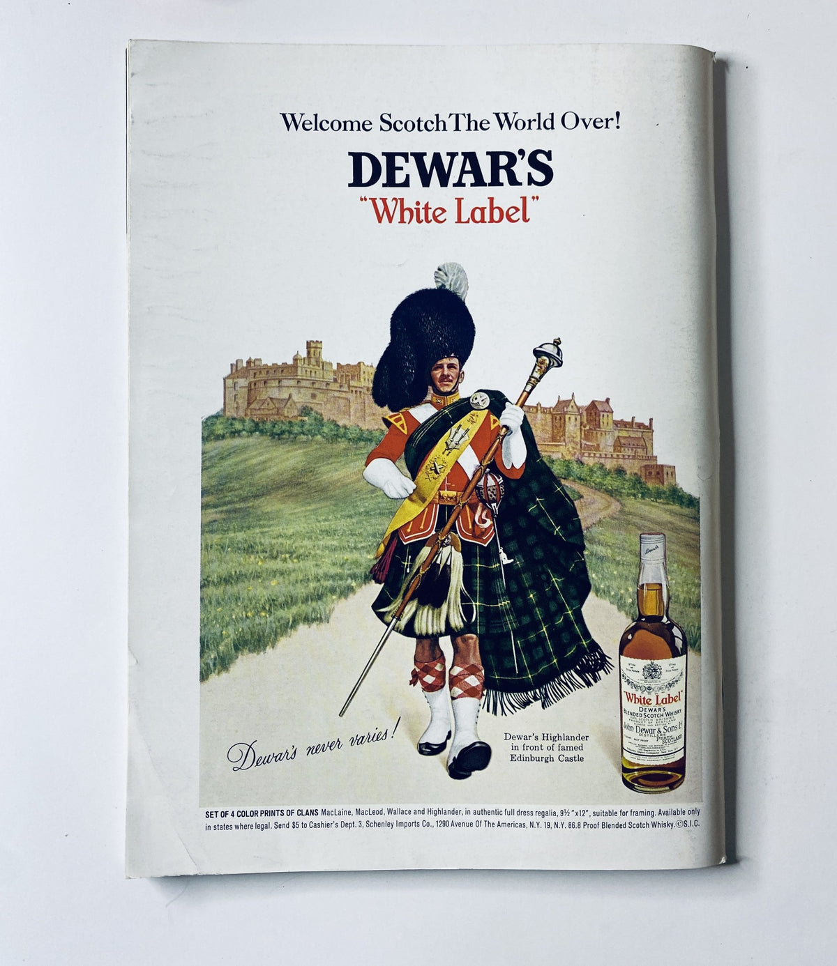 Advertisement for Dewar's White Label Scotch Whisky in The New Yorker Magazine March 15, 1969, featuring a Scottish kilted figure and a picturesque background.