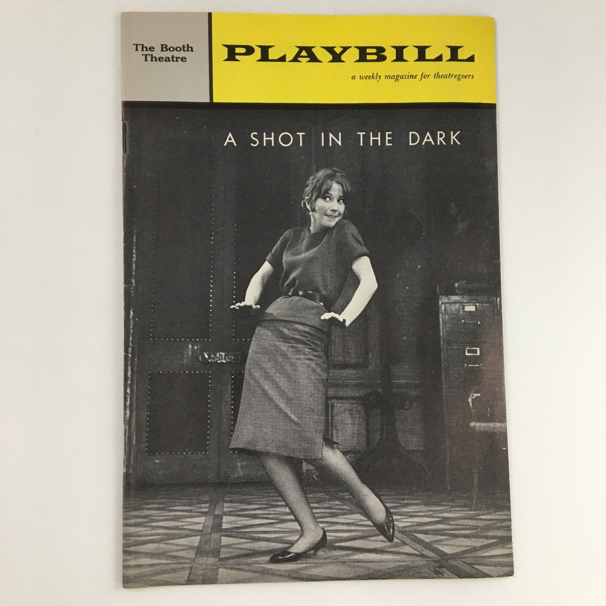 1962 Playbill for 'A Shot in the Dark' at The Booth Theatre featuring an elegant black-and-white cover with actress Julie Harris in a dynamic pose.