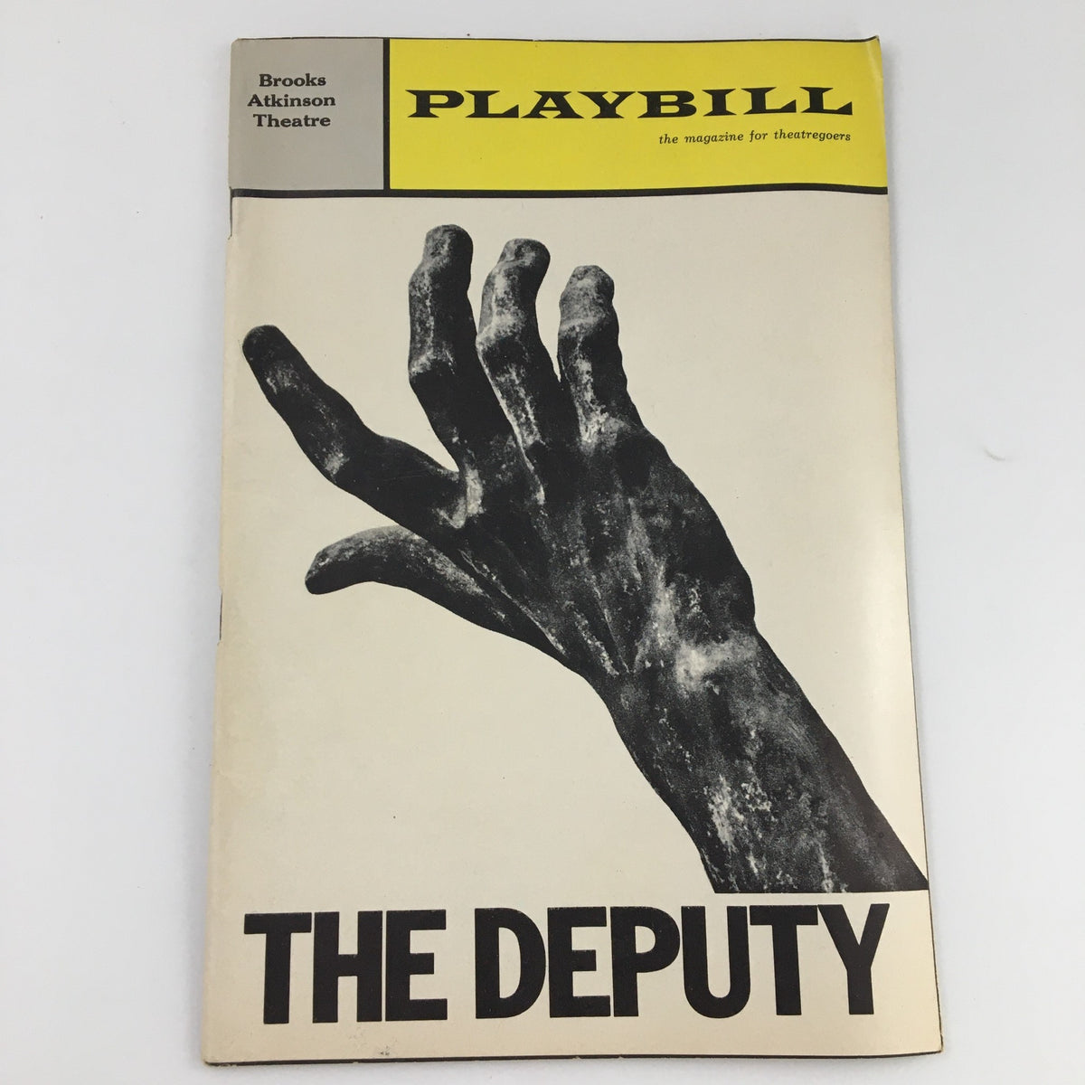 1964 Playbill for 'The Deputy' at Brooks Atkinson Theatre featuring a dramatic black and white hand image on cover.