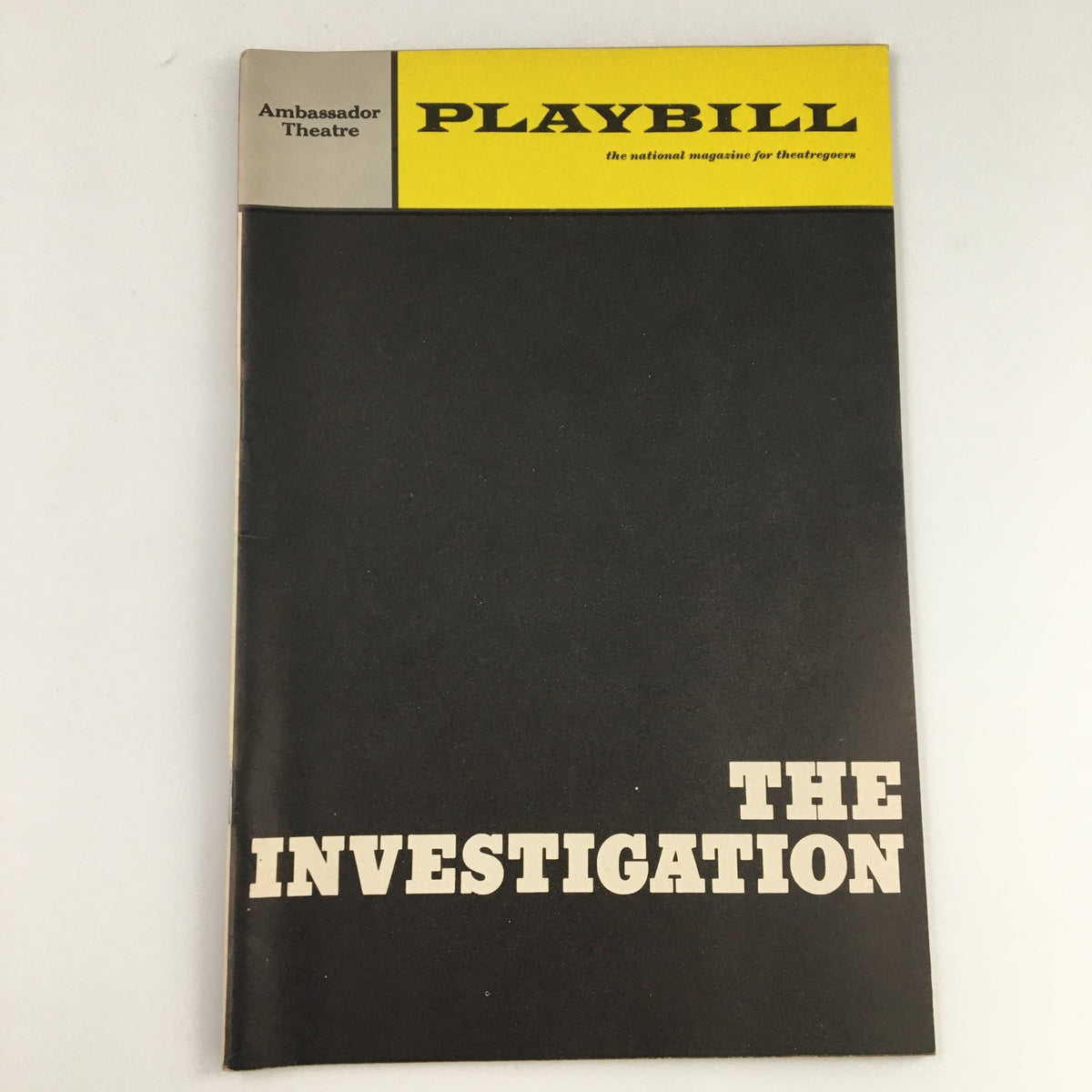 1966 Playbill for 'The Investigation' at Ambassador Theatre, featuring a black cover with bold white lettering.