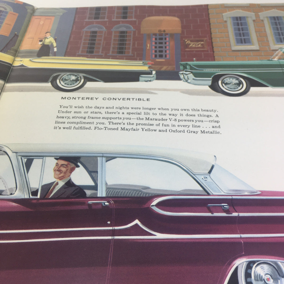 Illustration from the 1958 Mercury Monterey Montclair Park Lane Convertible Marauder car catalog, depicting the stylish Monterey Convertible with a smiling driver.