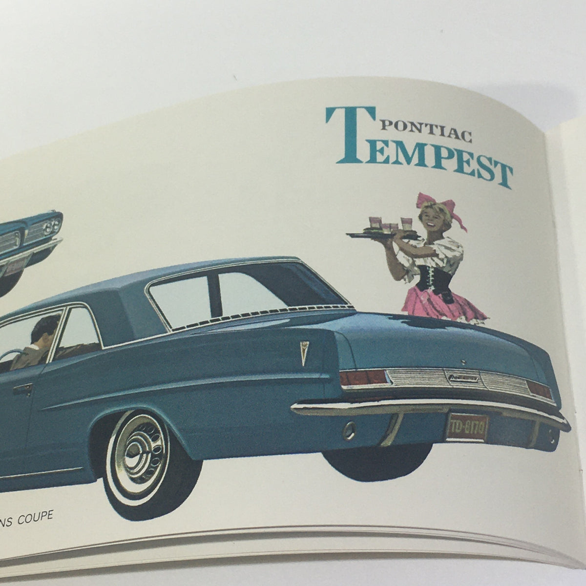 Vintage Go GM Any Time in the year 1963 Chevrolet-Pontiac-Buick Car Catalog featuring the Pontiac Tempest with a panoramic design and a waitress presenting drinks.