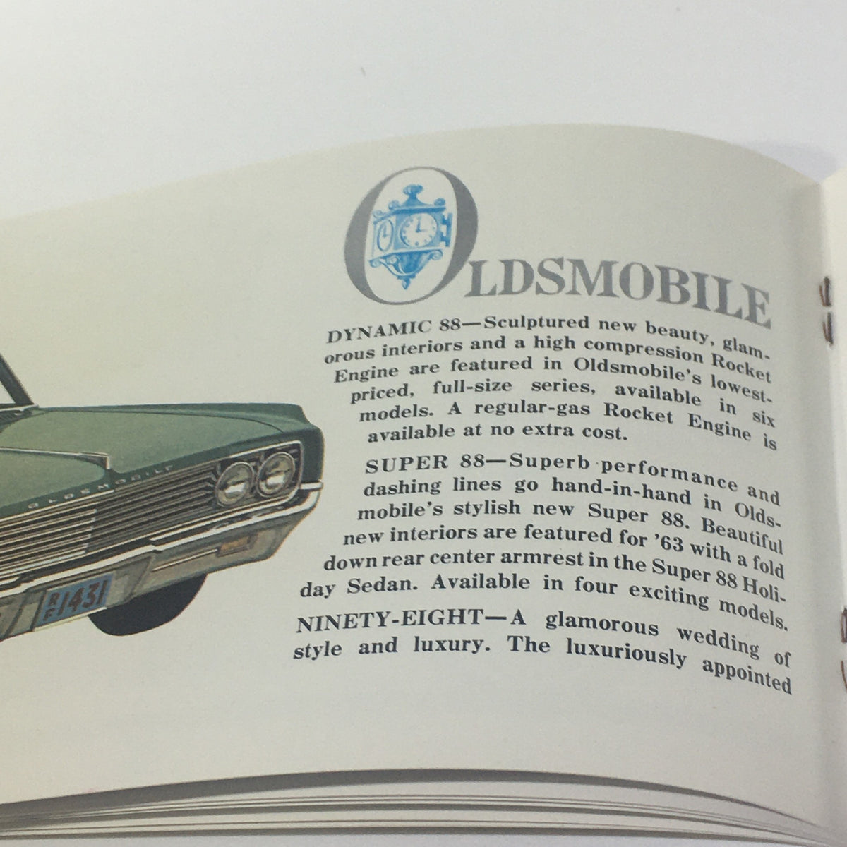 Vintage Go GM Any Time in the year 1963 Chevrolet-Pontiac-Buick Car Catalog detailing the Oldsmobile 88 with elegant interiors and luxurious design features.