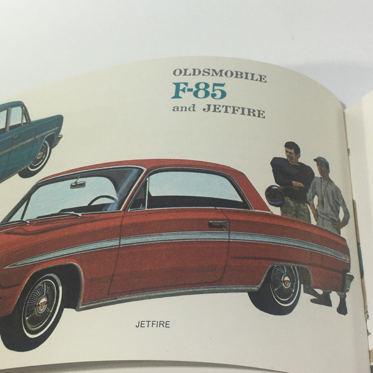Vintage Go GM Any Time in the year 1963 Chevrolet-Pontiac-Buick Car Catalog featuring the Oldsmobile F-85 and Jetfire models with stylish designs and sporty details.