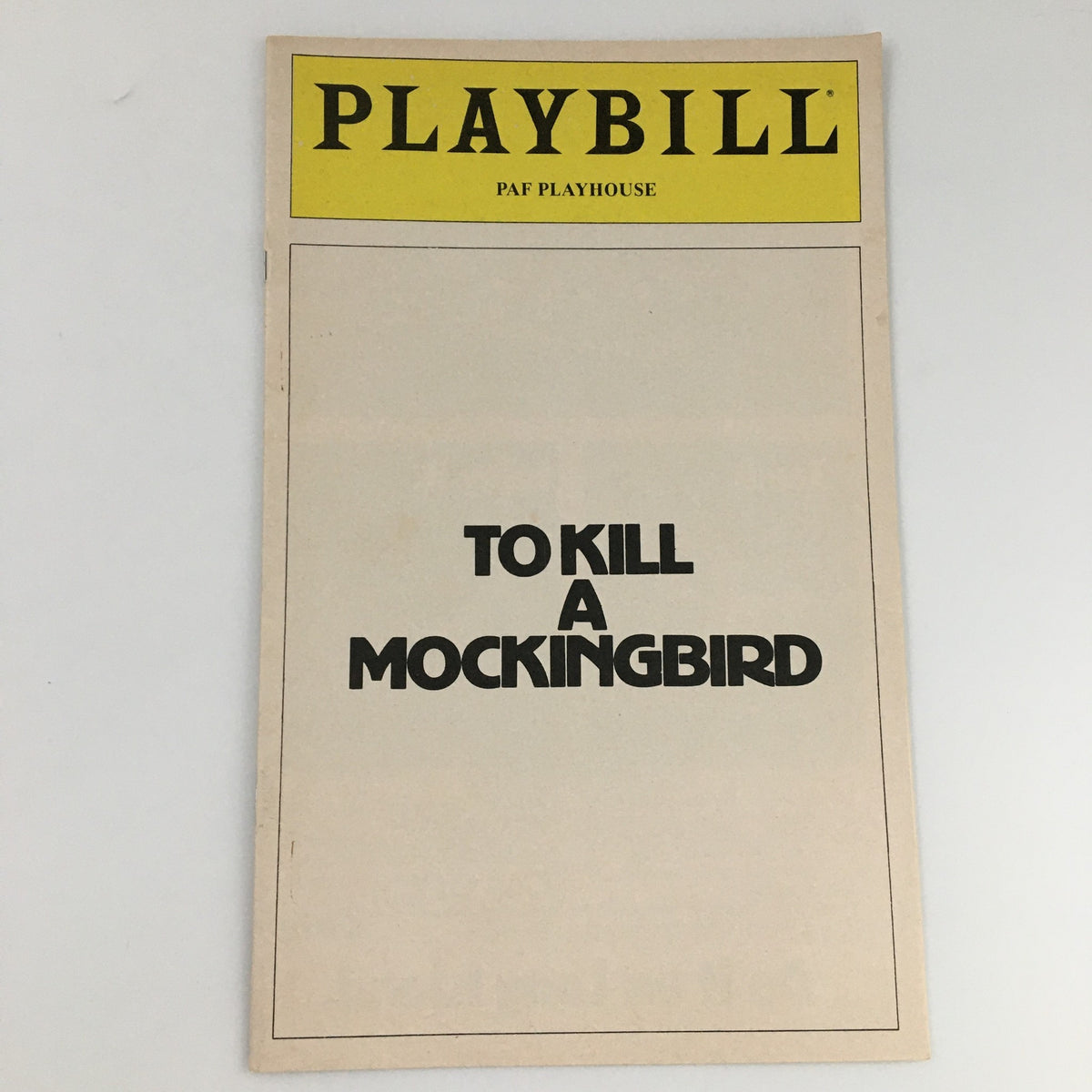 1980 Playbill for 'To Kill A Mockingbird' at PAF Playhouse featuring the title in bold letters on a beige background.