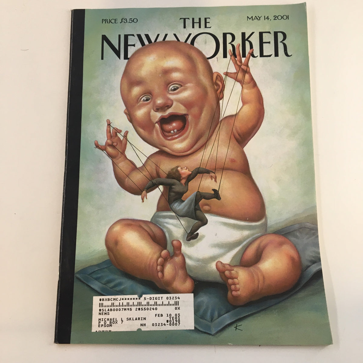 Cover of The New Yorker full magazine dated May 14, 2001, featuring an illustration titled Puppetmaster by Anita Kunz, depicting a large baby controlling a man with strings.