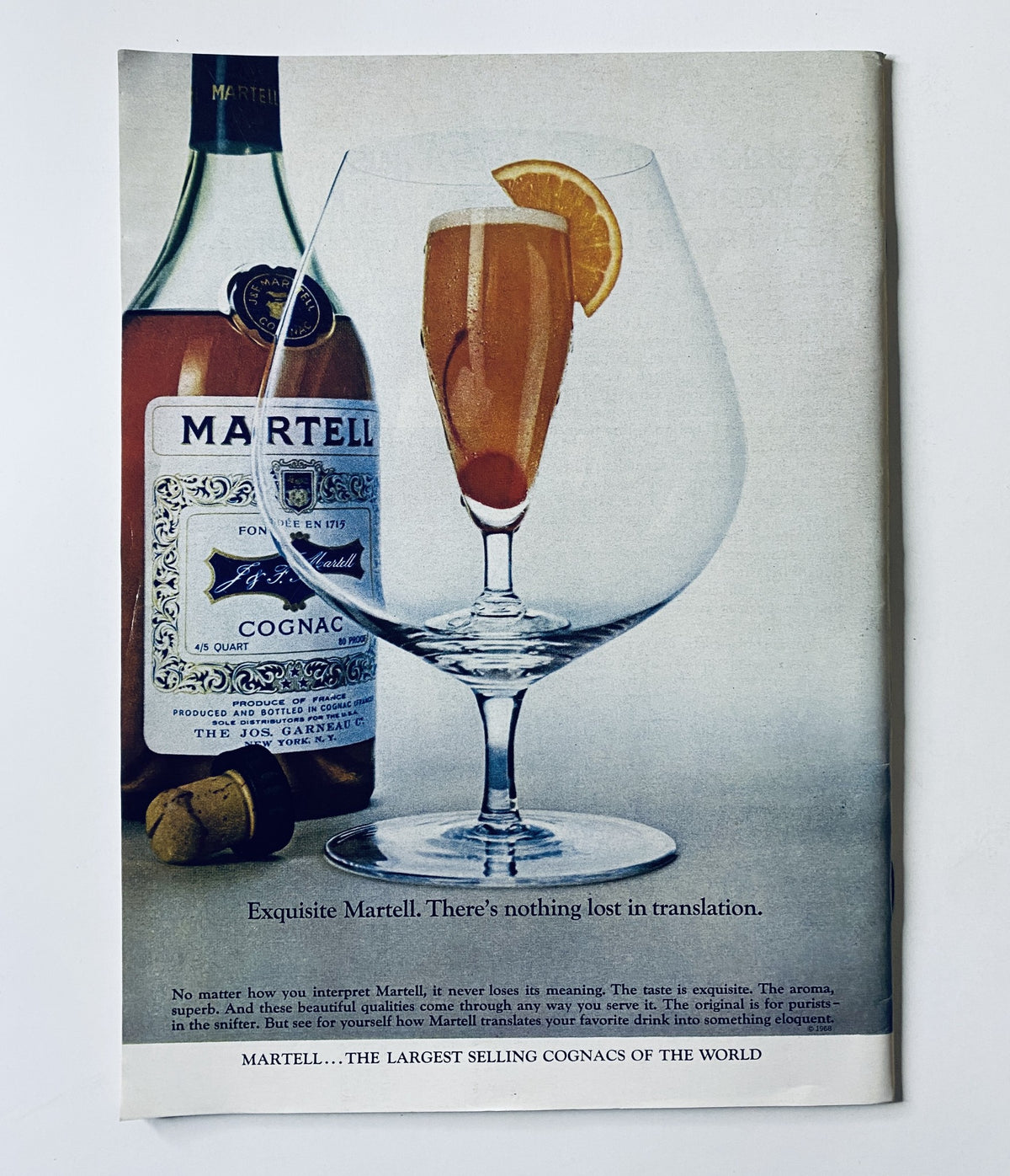 Advertisement for Martell Cognac in The New Yorker Magazine August 29, 1970, detailing a luxurious drink presentation with a glass and bottle of Martell.