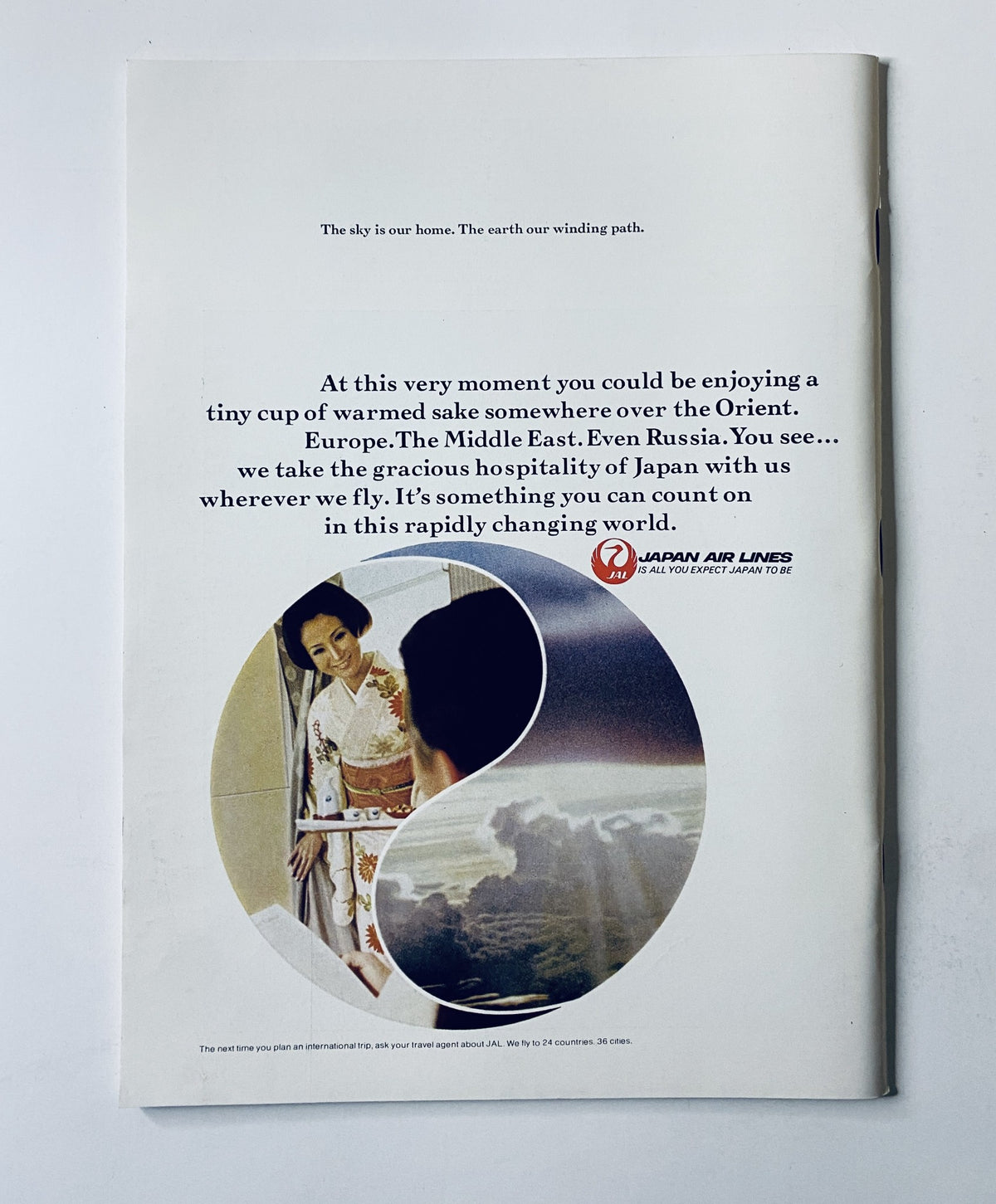 Vintage advertisement featuring a serene landscape and a traditional Japanese woman representing Japan Air Lines. The title reads 'The New Yorker Magazine January 23, 1971 Ronald Searle Round Table Cat Cover VG', highlighting its connection to travel and culture.