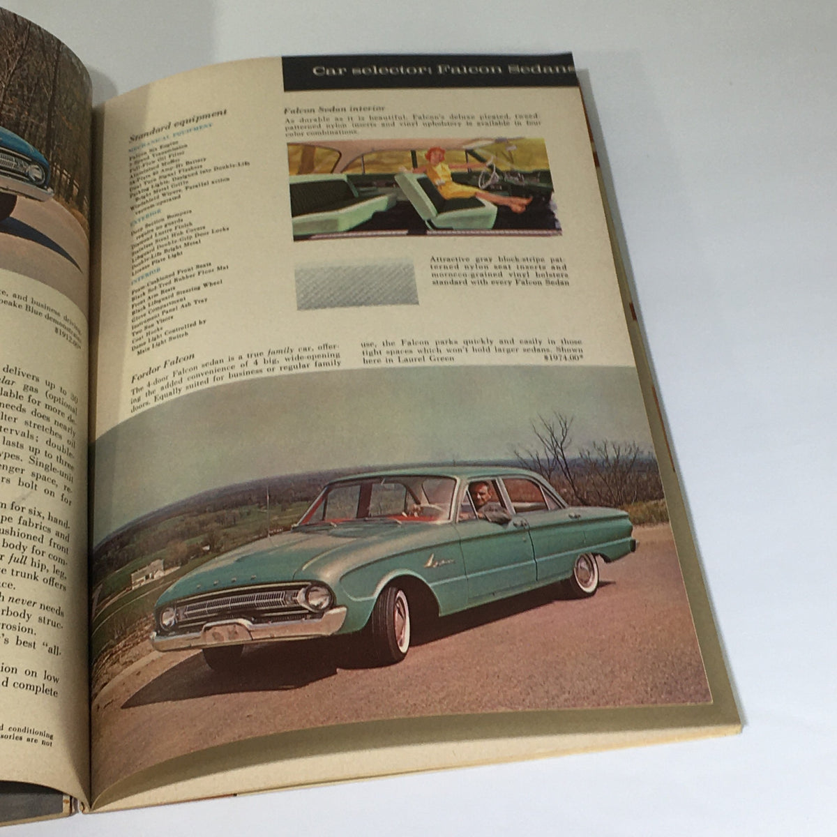 Interior view of a 1961 Falcon Sedan with specifications; part of the Vintage 1961 3rd Year of Buyer's Digest of New Car Facts Car Catalog Brochure.