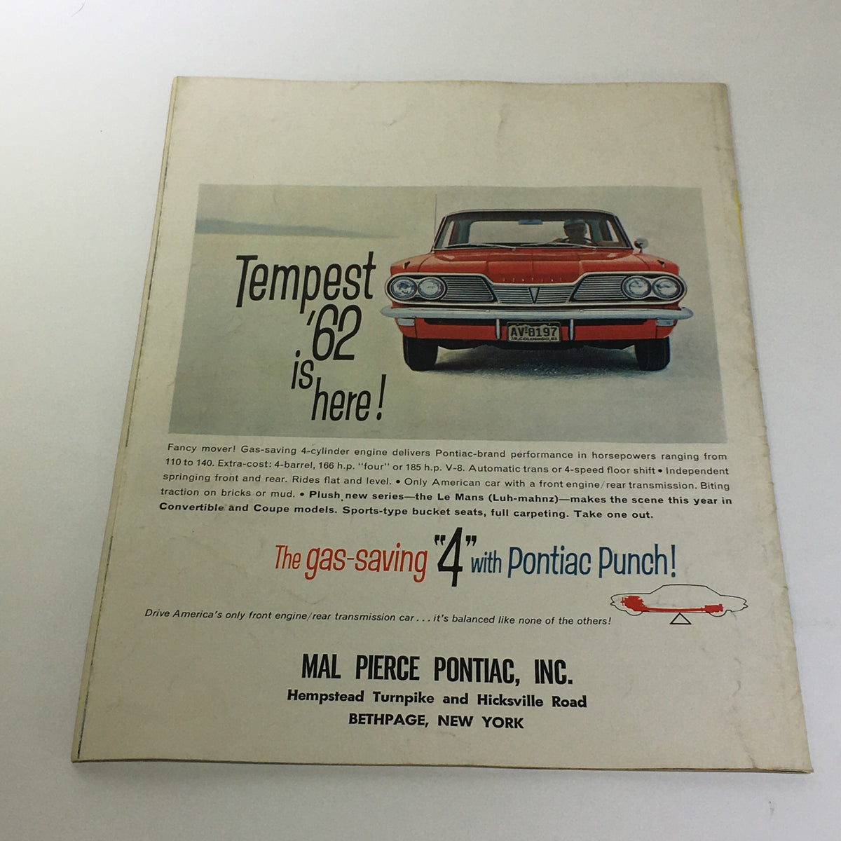 Vintage 1962 Pontiac Review America's #1 Road Car featuring the Tempest on the front cover, showcasing Pontiac's gas-saving performance, with detailed specifications and advertisements from Mal Pierce Pontiac, Inc. in Bethpage, New York.