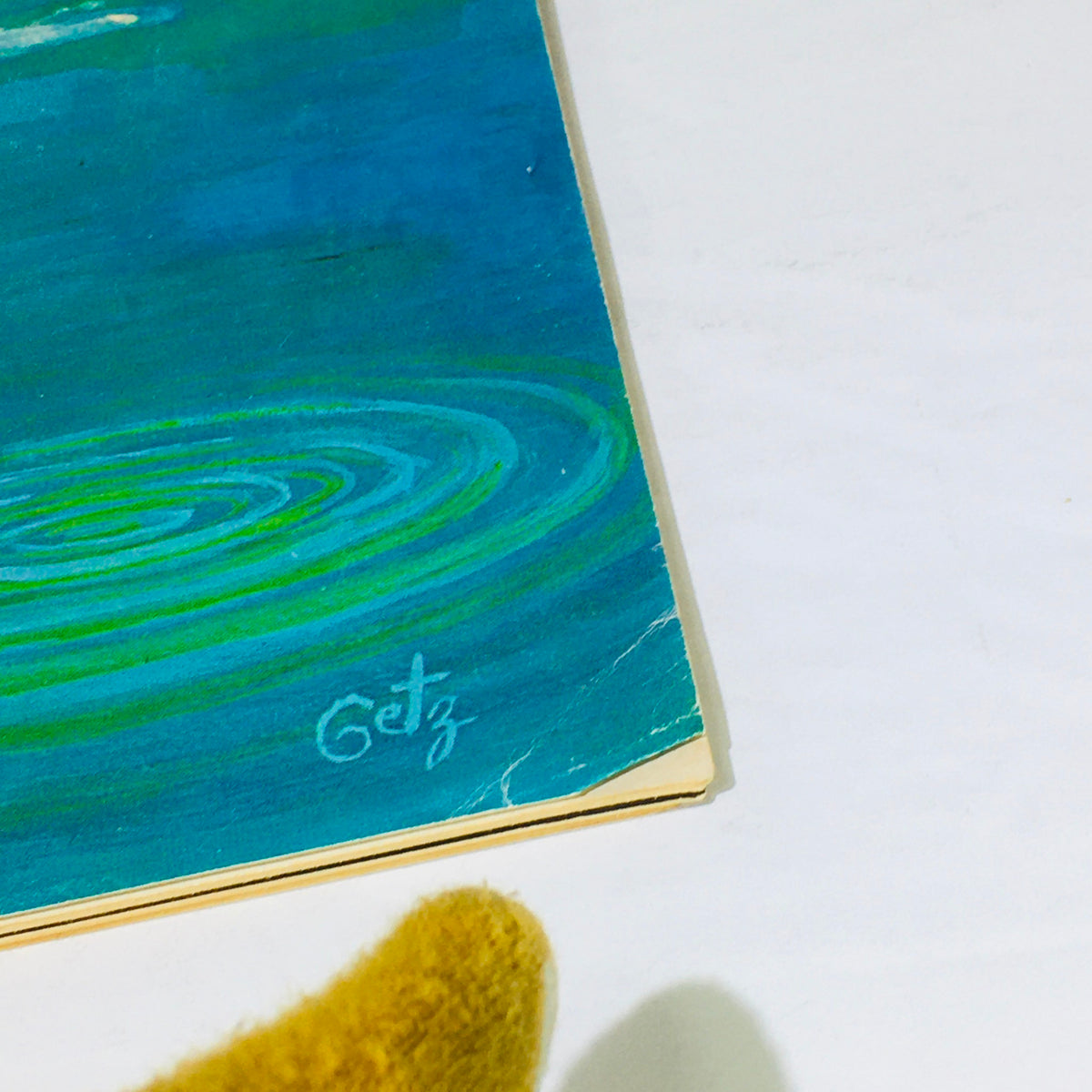 Close-up detail of The New Yorker magazine cover dated August 27, 1966, highlighting the artistic signature of Arthur Getz and vibrant blue water.