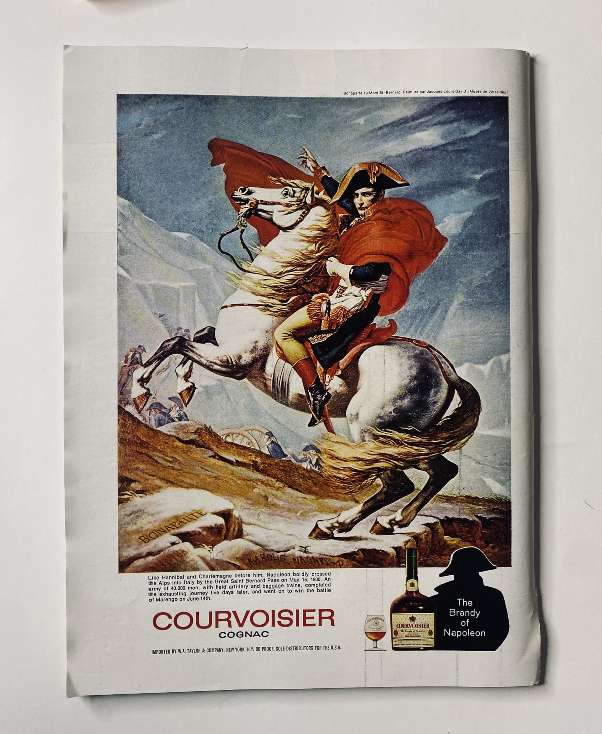 Ad for Courvoisier Cognac featuring a painting of Napoleon riding a horse, alongside a description of the brand as 'The Brandy of Napoleon', from The New Yorker Magazine May 20, 1972.