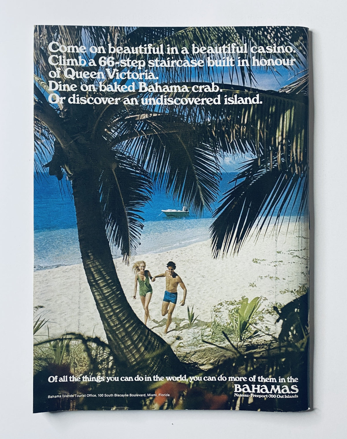 The New Yorker Magazine April 10, 1971 cover featuring a stained glass flower design by Charles Martin. A scenic tropical beach with a couple walking on the sand is displayed, emphasizing a vacation atmosphere.