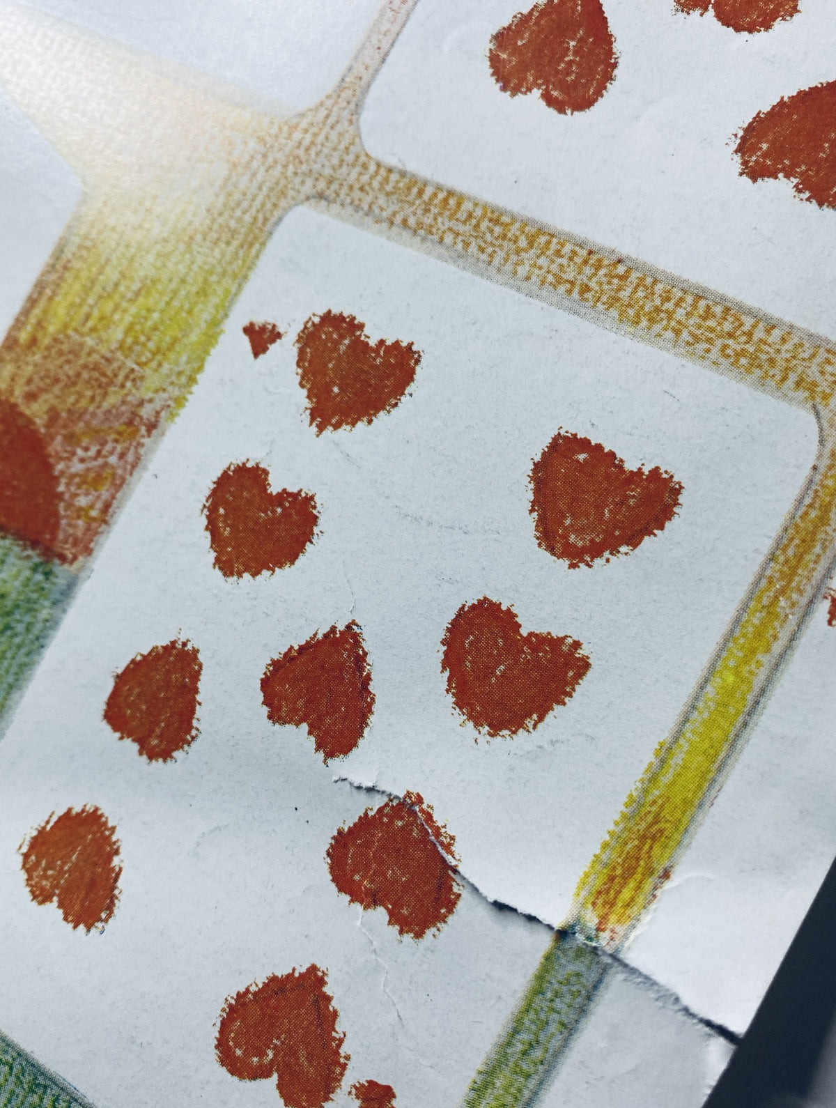 Close-up of playing cards featuring heart designs, from The New Yorker Magazine February 13, 1971, cover by André François.