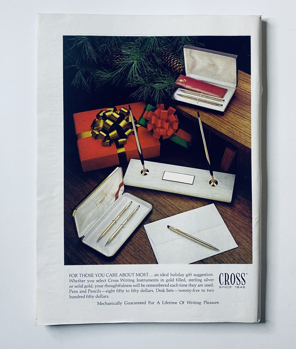 Ad page from The New Yorker Magazine, November 25, 1972, showcasing Cross writing instruments as holiday gift suggestions, with a backdrop of festive decorations.
