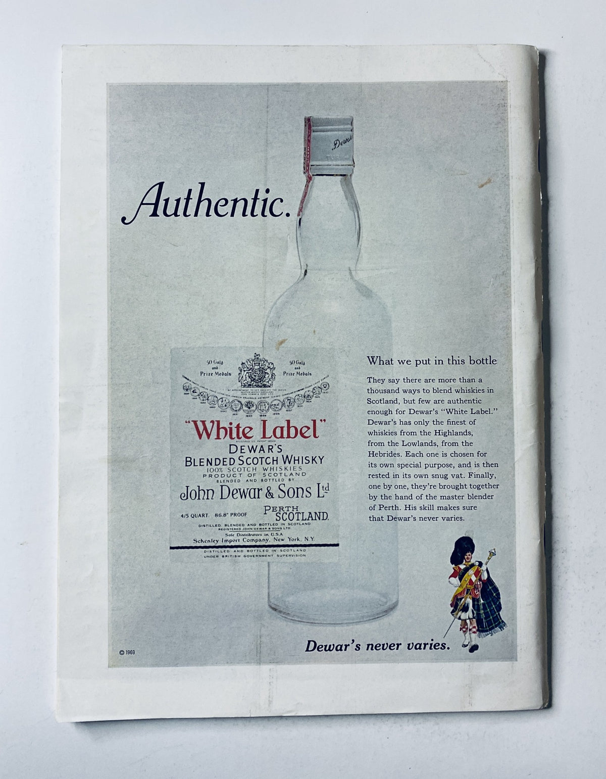 Authentic advertisement for Dewar's Blended Scotch Whisky featuring a bottle and label design, accompanying the title The New Yorker Magazine April 21, 1973 City Buildings Cover R. Davidson VG.