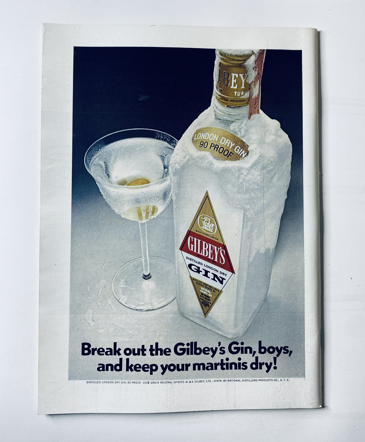 Advertisement from The New Yorker Magazine March 24, 1973, promoting Gilbey's Gin with a captivating image of a martini and the bottle, emphasizing enjoyment.